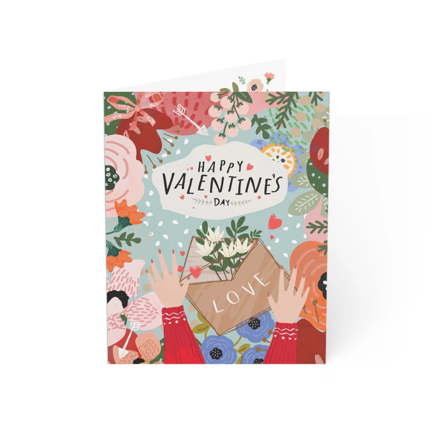 Pink Valentine's Day card with botanical design, 'Happy Valentine's Day' text, and hands holding flowers.