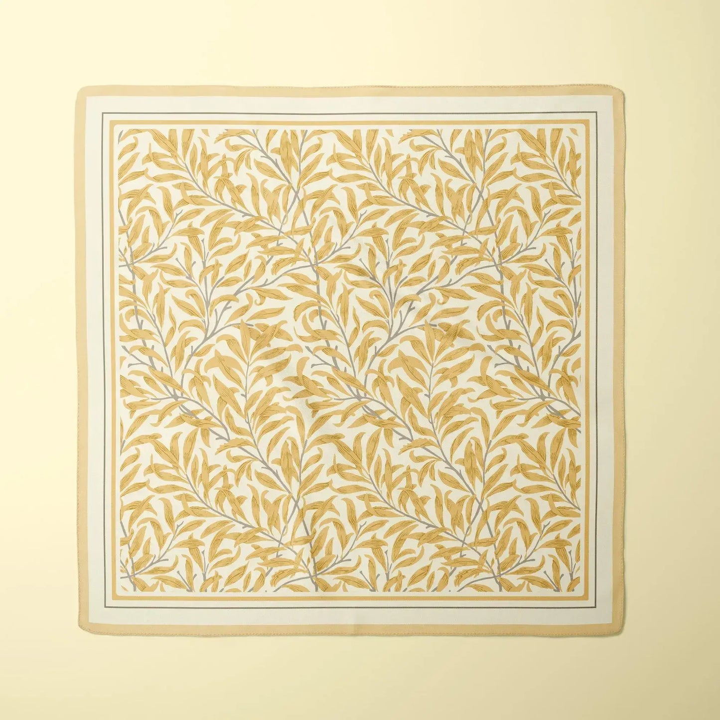 William Morris Silk Scarf Blue Willow Boughs featuring intricate botanical patterns in earthy tones on a soft background.