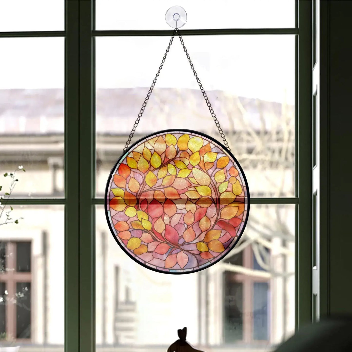window decorating ornament printed with autumn leaves
