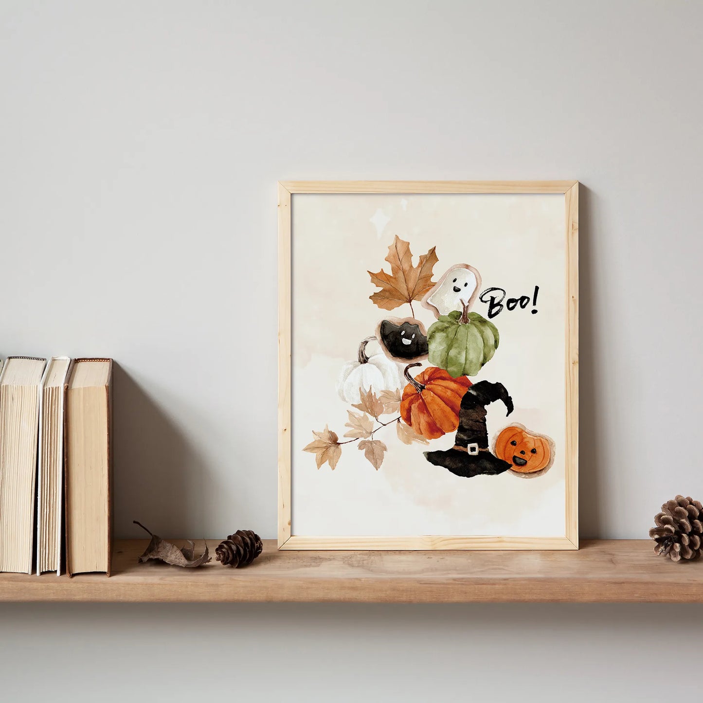 bookshelf with Watercolor Cute Halloween "Boo" Poster from Blue Water Songs on it