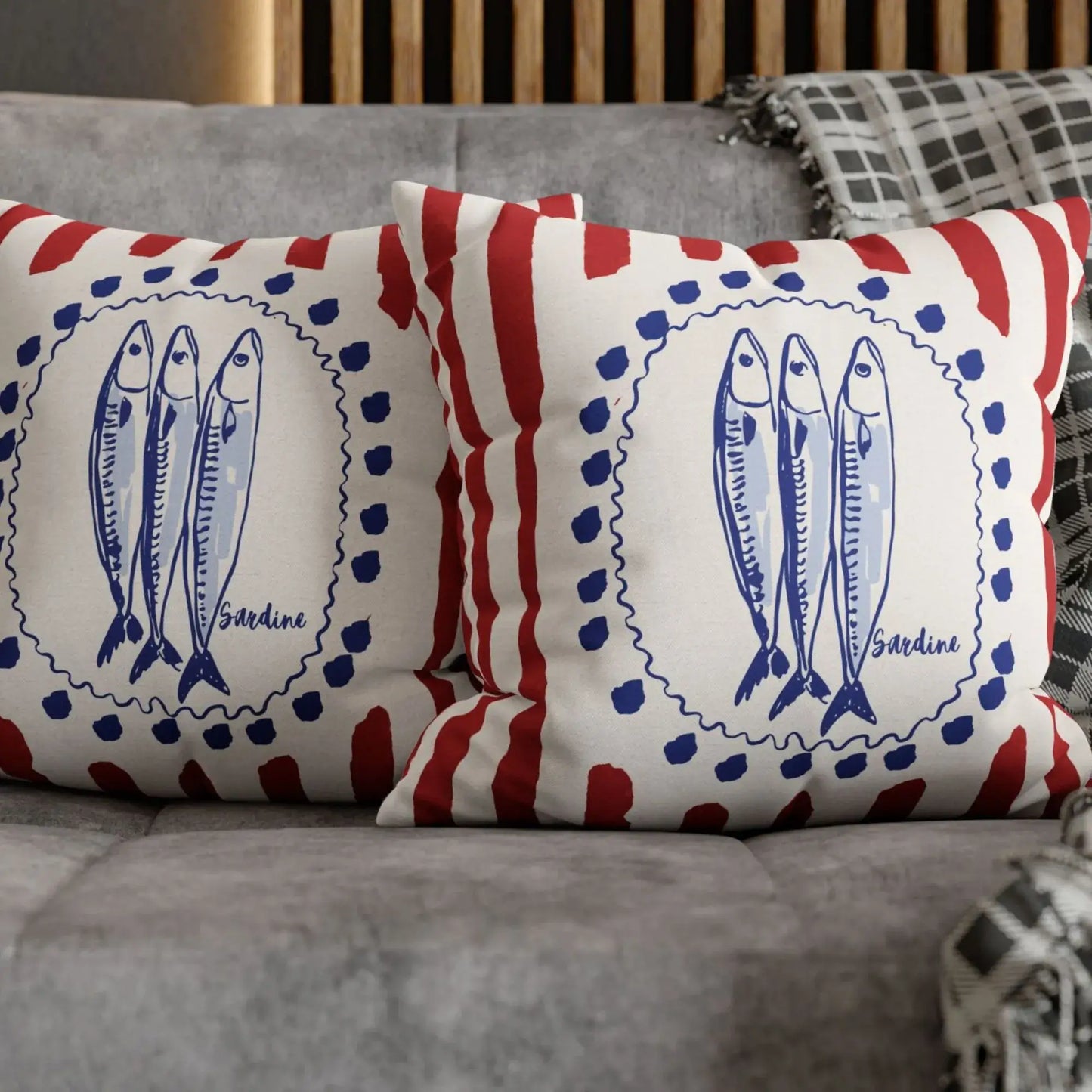 Sardine and Red Stripes Coastal Pillow and Cover featuring blue sardines on red striped background.