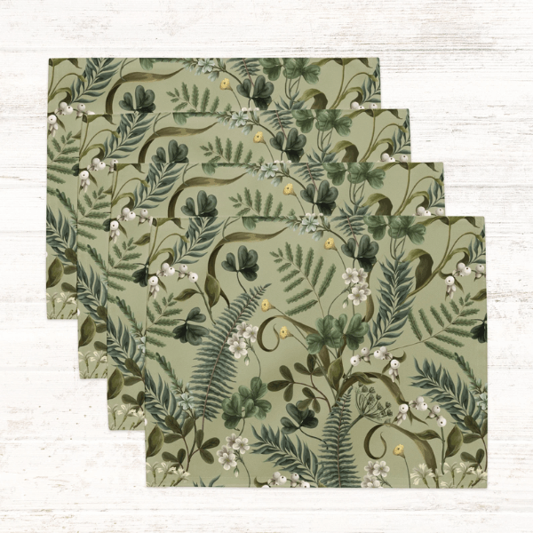 Wild Fern Garden Placemats set featuring delicate ferns and botanical details in soothing green shades.