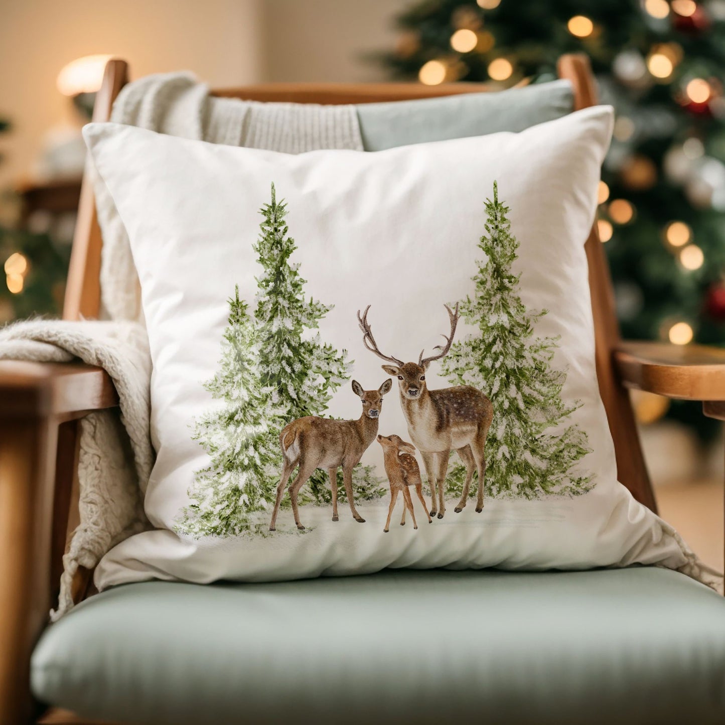 Christmas pillow with deer and trees on wooden armchair – festive holiday living room