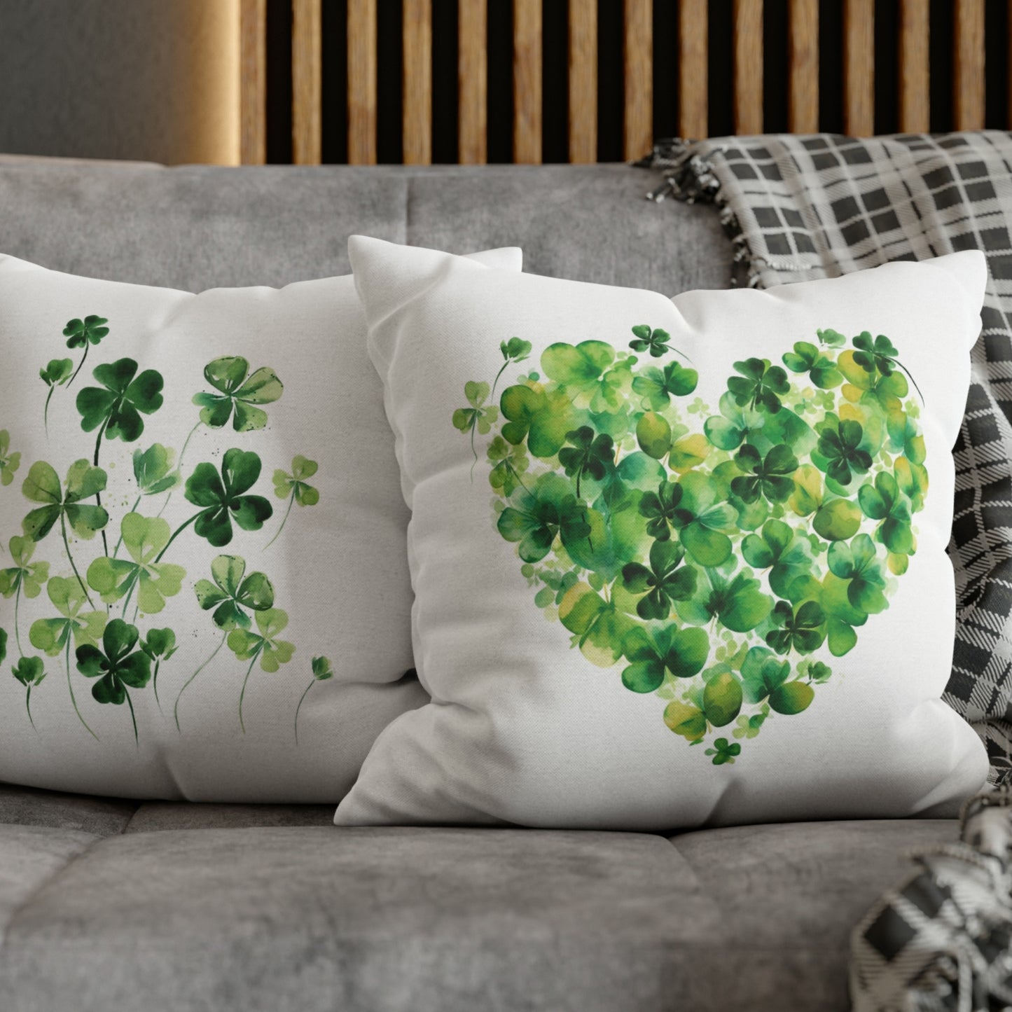 a close up of two pillows on a couch