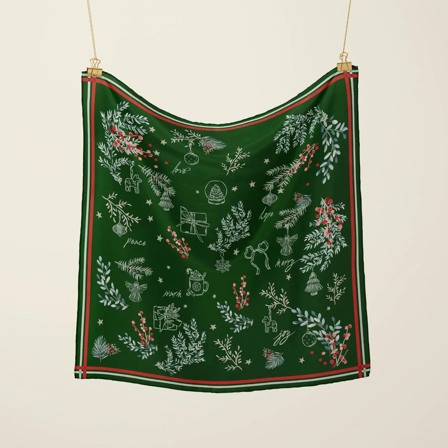 Green Christmas nature-inspired silk scarf with white hand-drawn festive illustrations, holly leaves, and red berries — elegant holiday fashion accessory