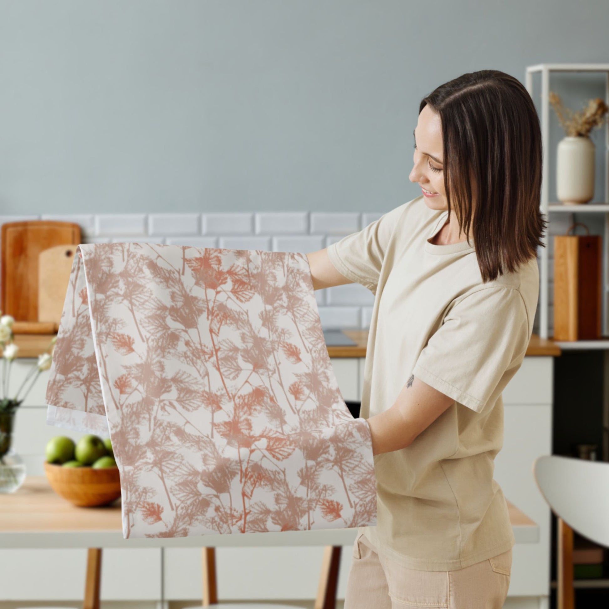 woman holding Fall Birch leaves - orange TABLE RUNNER from Blue Water Songs on her hands