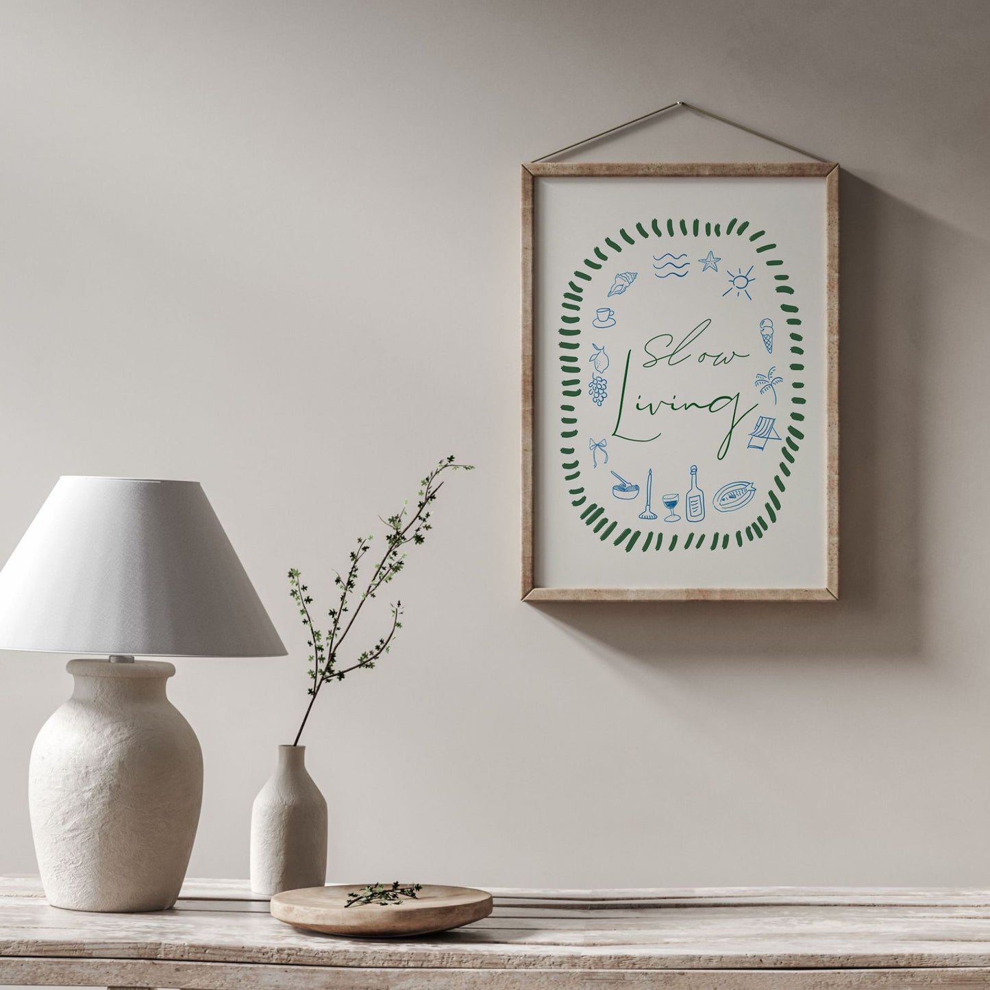 minimal room decorated with beige lamp and slow living wall art