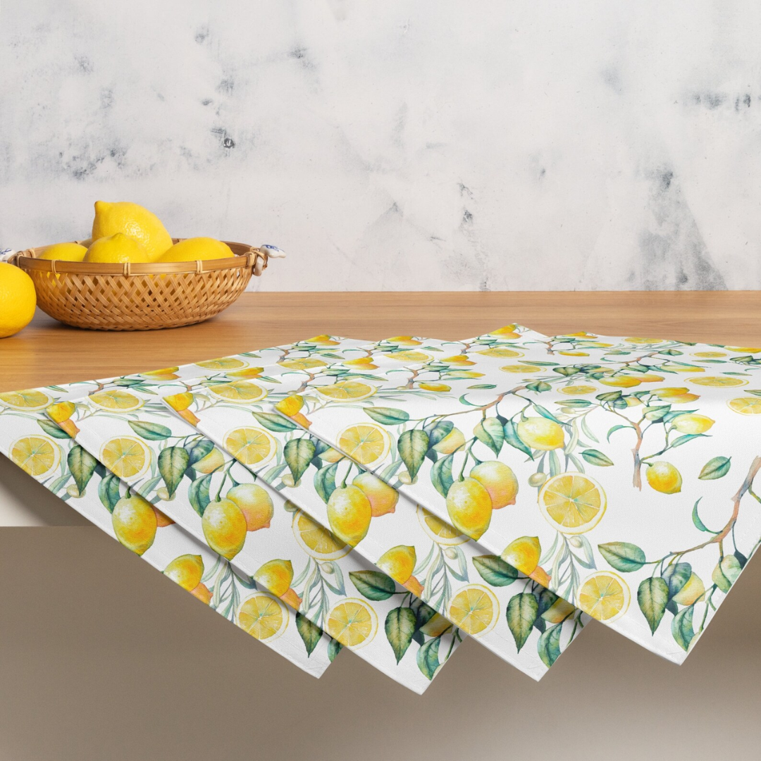 set of 4 placemats with lemon pattern from Blue Water Songs on wood table