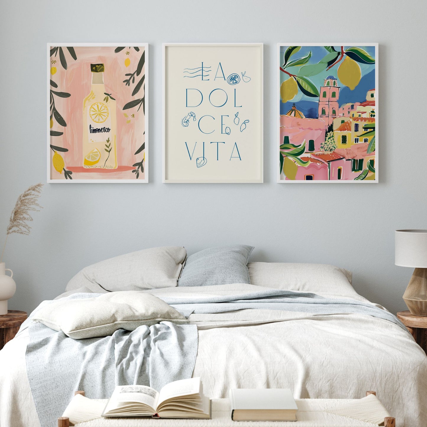 Minimal coastal bedroom decorated with 3 posters on the wall