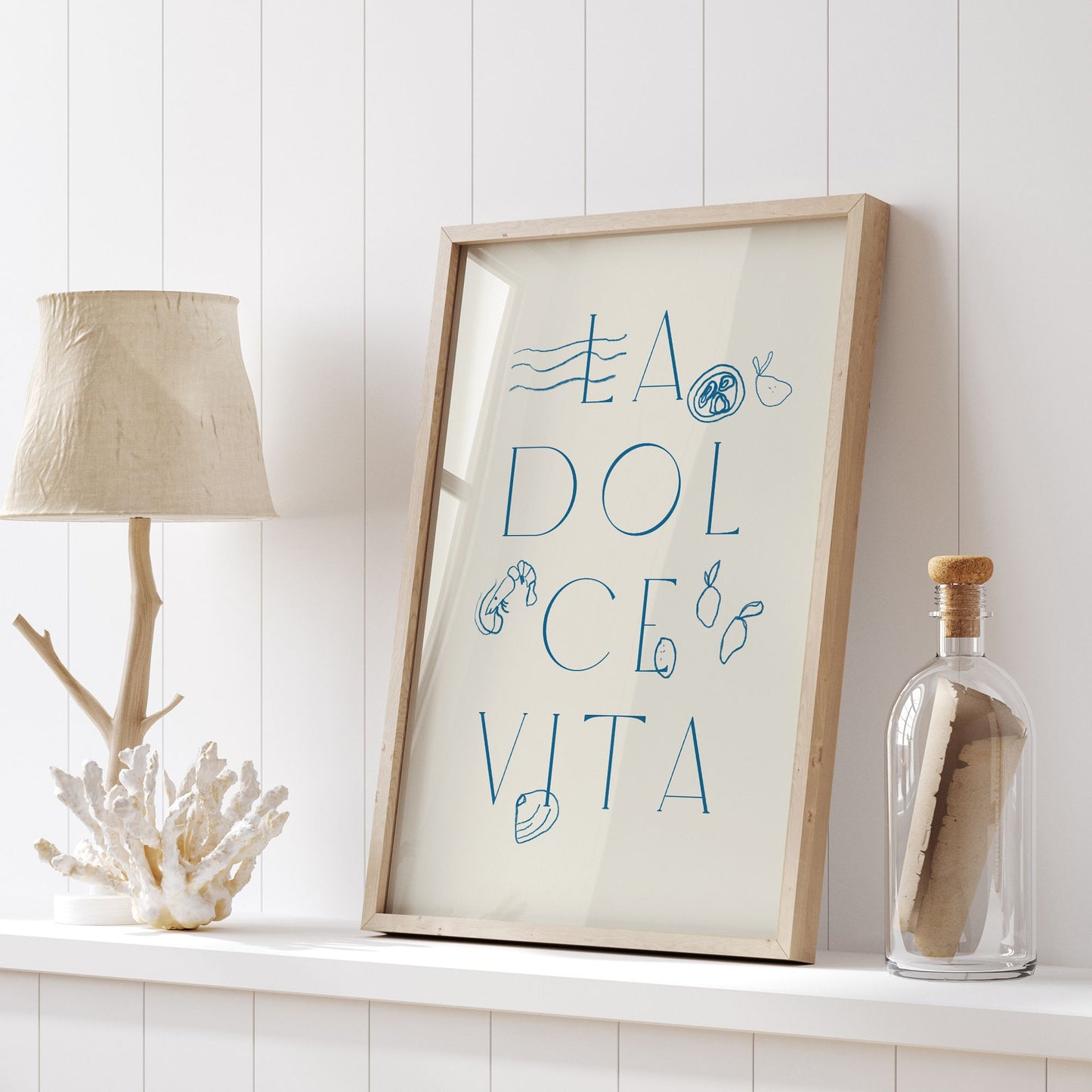 white shelf with La Dolce Vita poster wooden frame on it