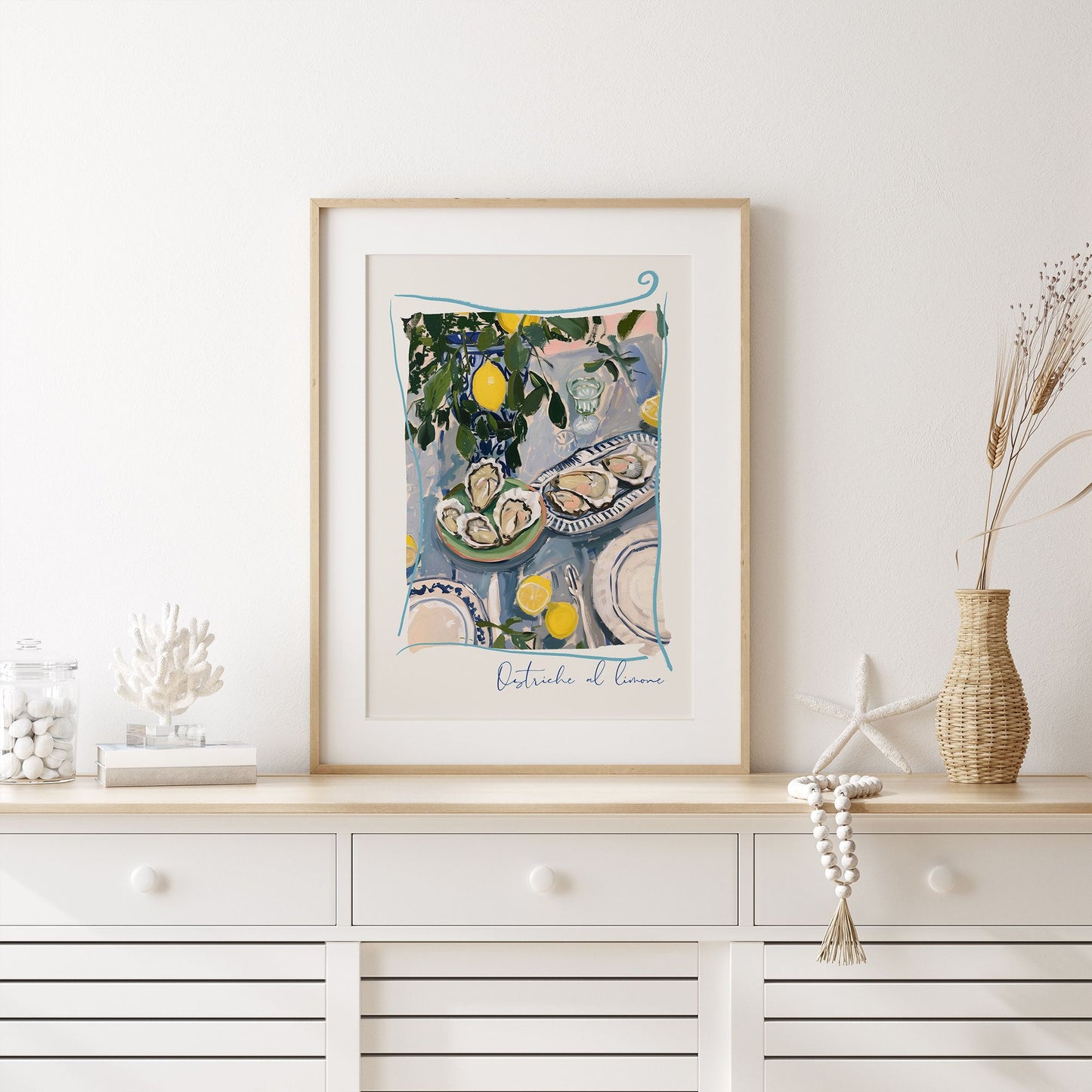 white shelf is decorated with big Oyster painting, sea star and coral 