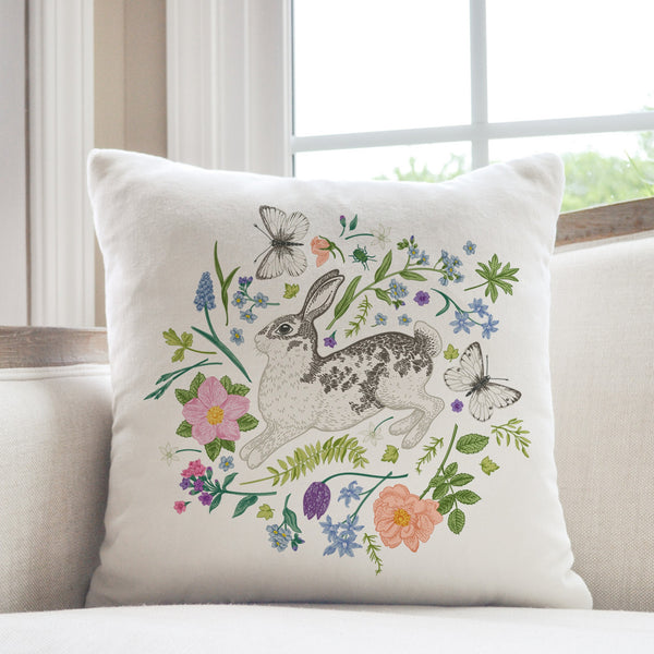 Bunny and Spring meadow PILLOW from Blue Water Songs on white sofa