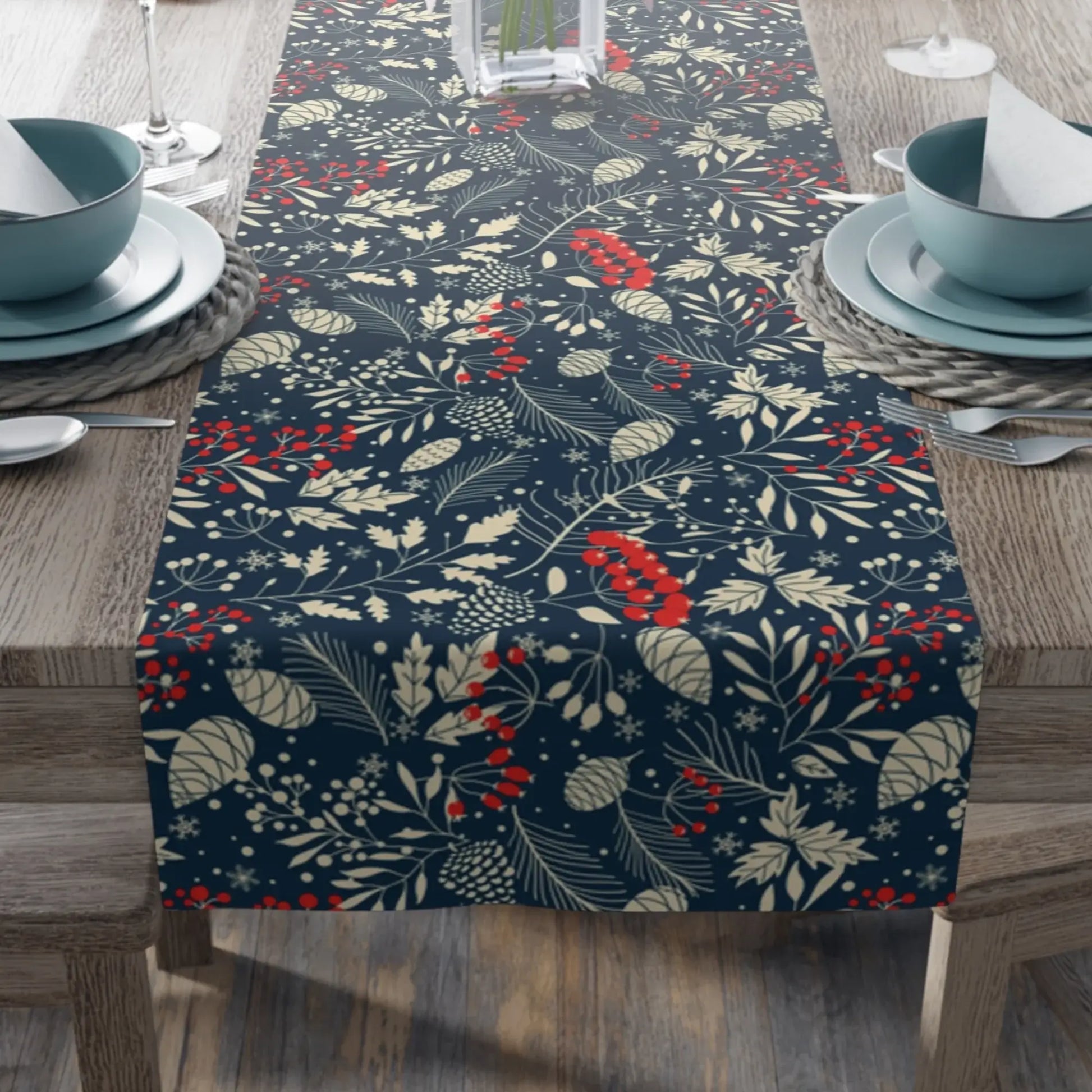 Blue Winter Botanical Christmas Table Runner featuring pine and berry design on a dining table.