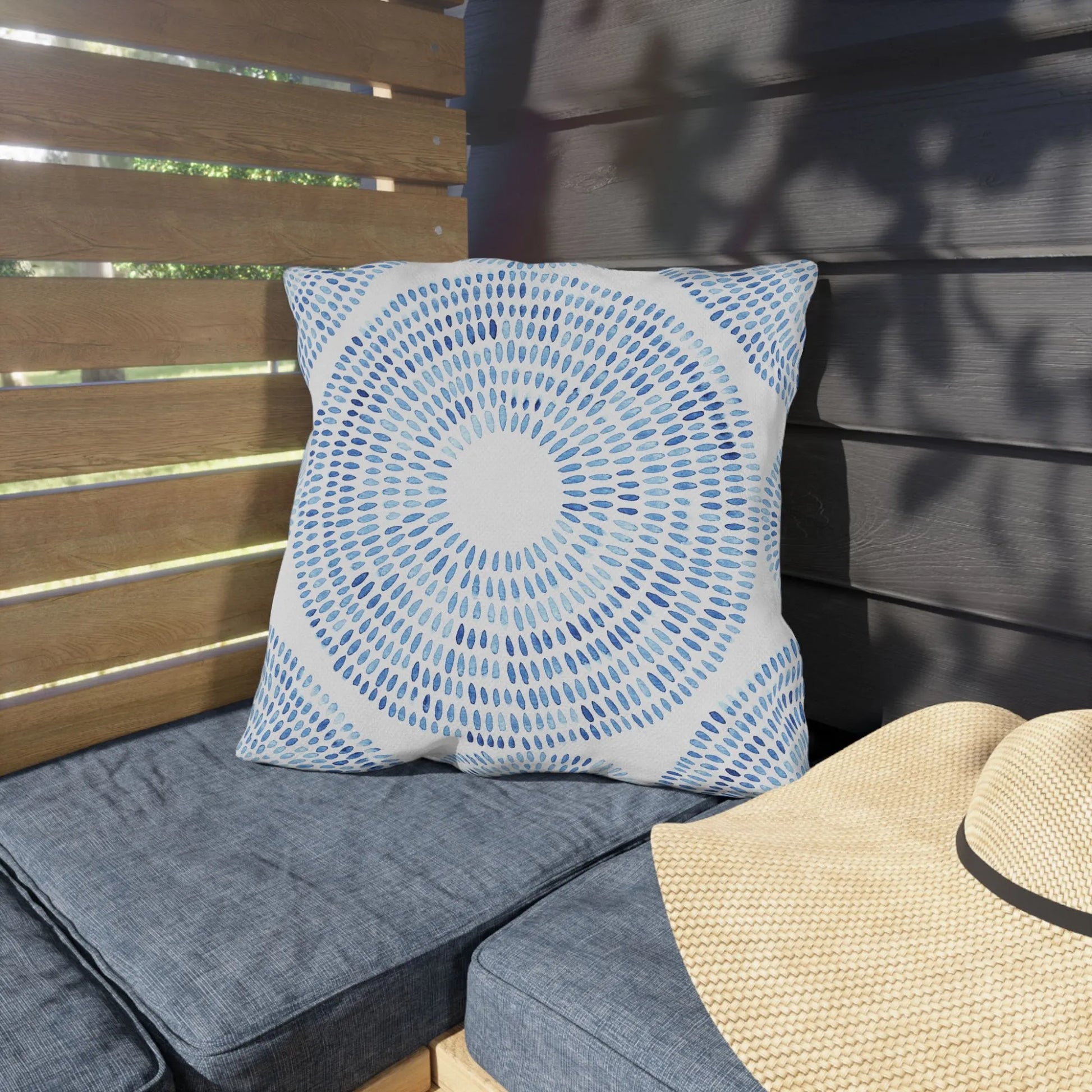 Blue Watercolor Hand-Painted Pattern| OUTDOOR PILLOW from Blue Water Songs sitting on bench outside