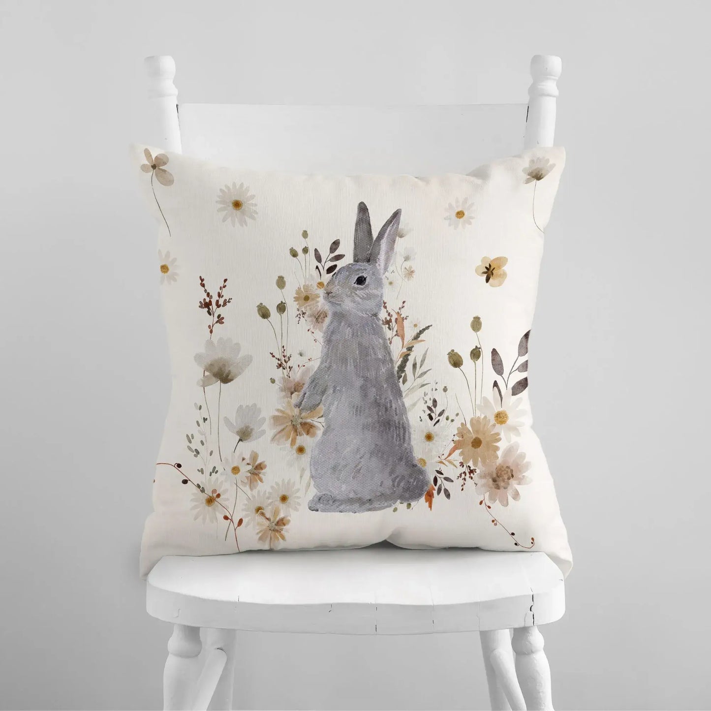 white chair with Bunny Fall Pillow Cover on it