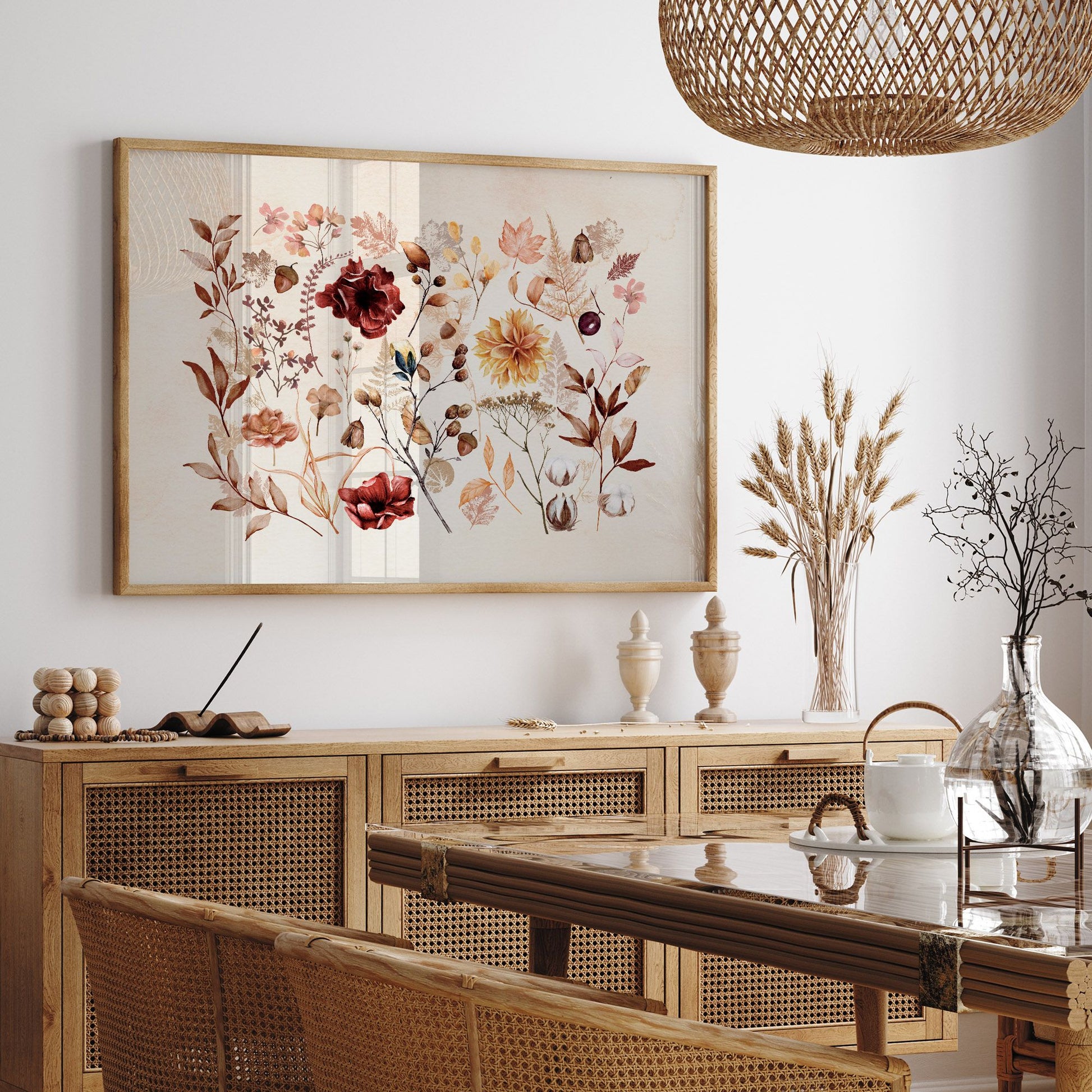 living room with rattan furniture and autumn botanical painting from Blue Water Songs on wall