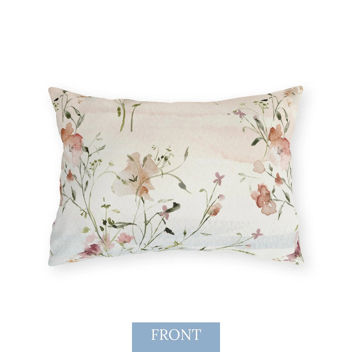 Rectangular outdoor pillow featuring pastel wildflowers and butterflies on light watercolor backdrop