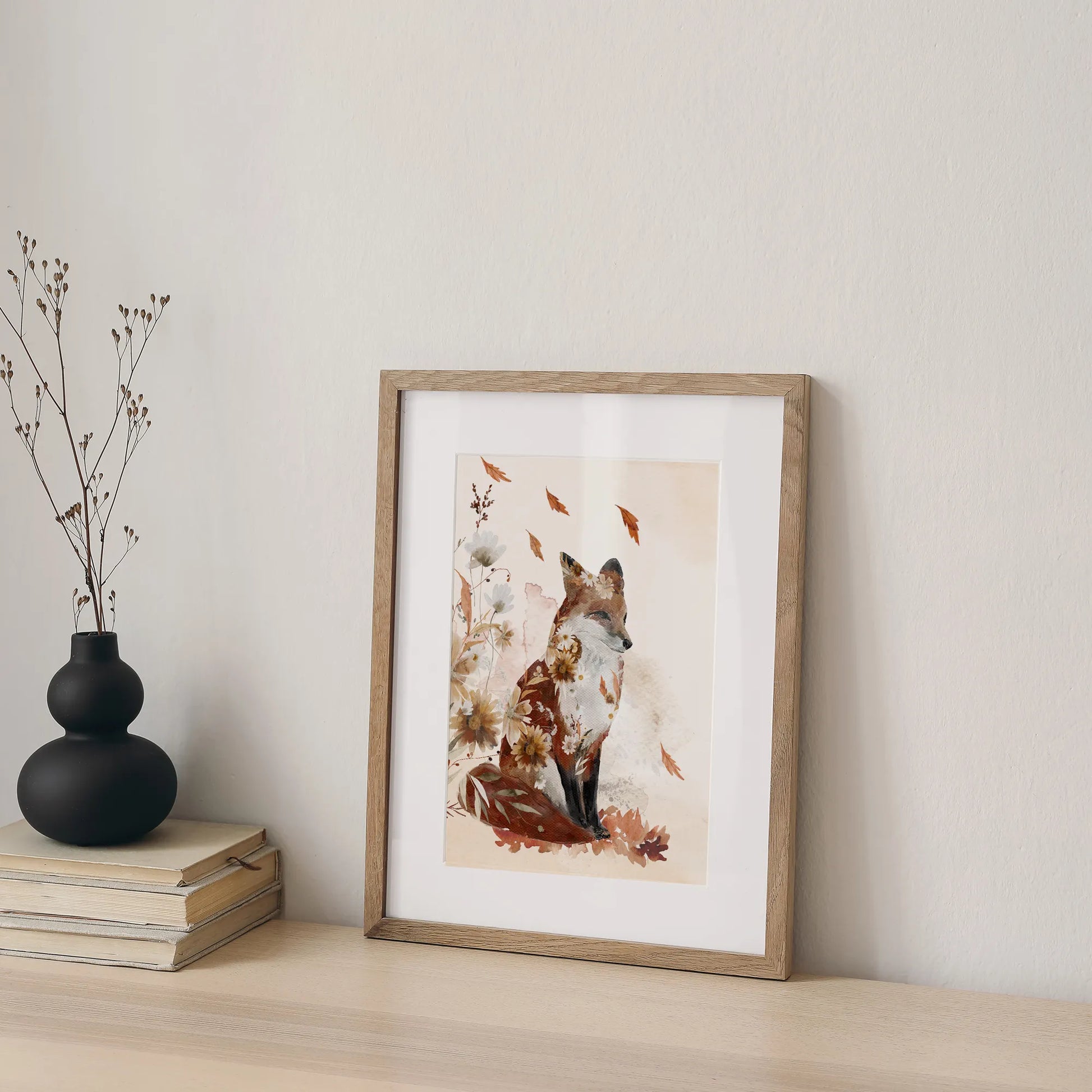 Fox Autumn Art Print placing next to a pile of books