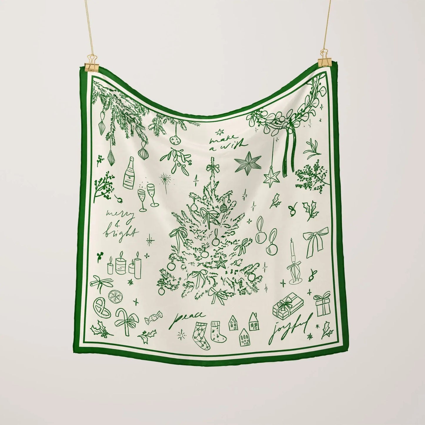 Green Christmas Silk Scarf hanging to display full square shape and elegant border