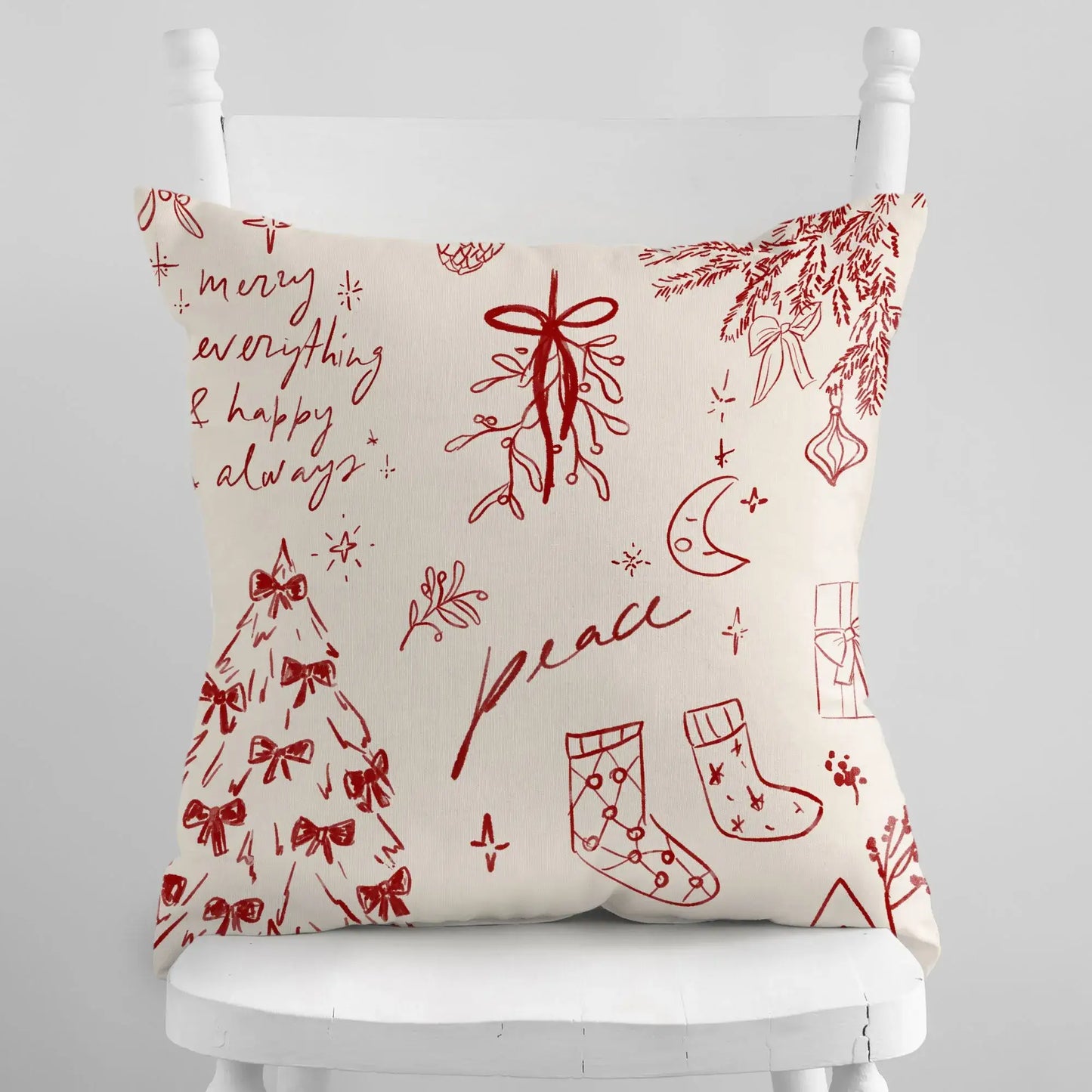 Hand-Drawn Christmas Pillow featuring red line art with peace, merry everything & happy always on ivory fabric.