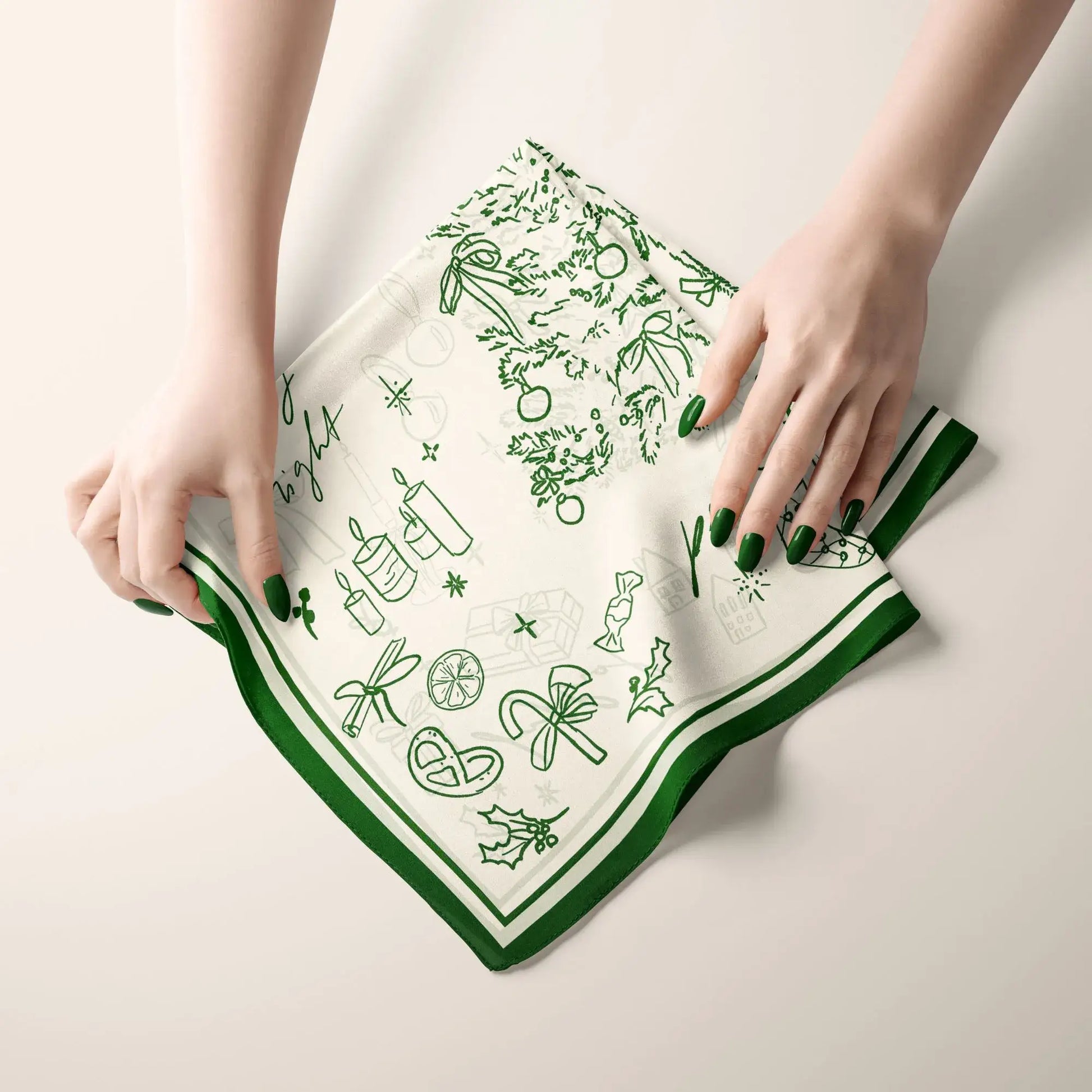 Green Christmas Silk Scarf gently held by hands, capturing the warmth and joy of Christmas gifting.