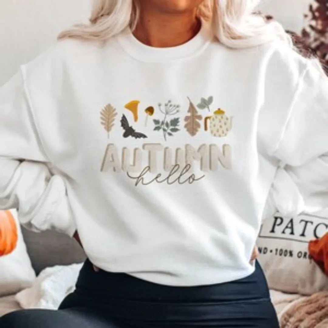 woman in Hello Autumn white SWEATSHIRT from Blue Water Songs