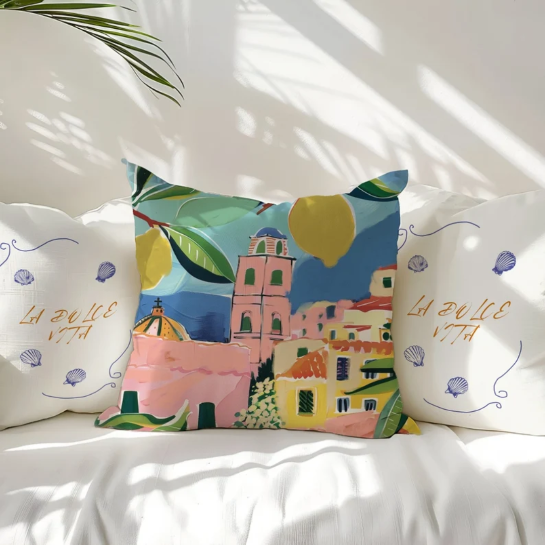 3 throw pillows on white sofa