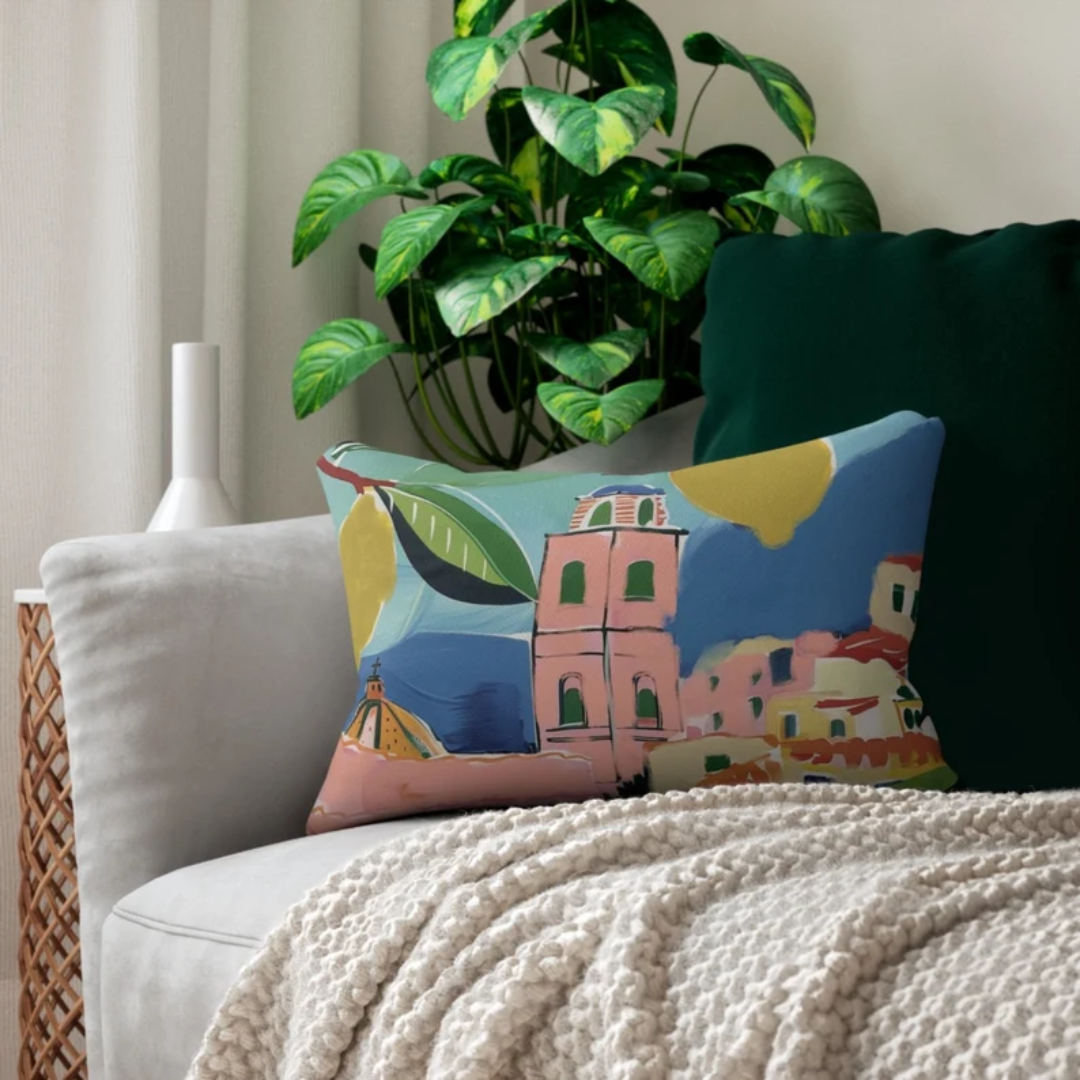 Lumbar lemon pillow on grey sofa