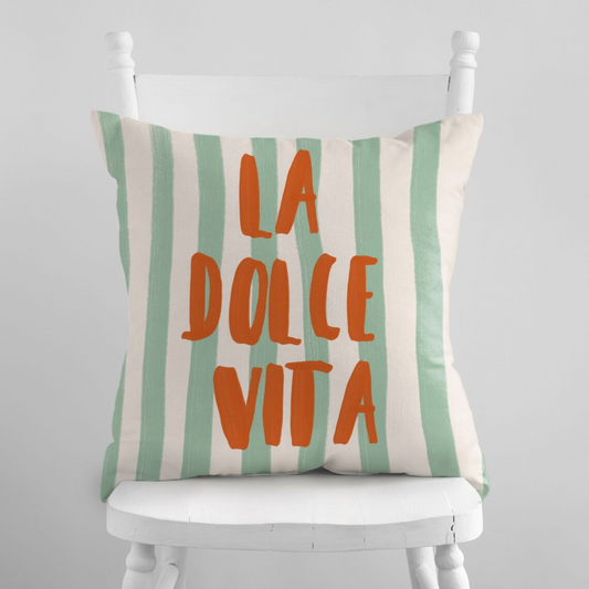 La Dolce Vita Green striped PILLOW from Blue Water Songs on white chair