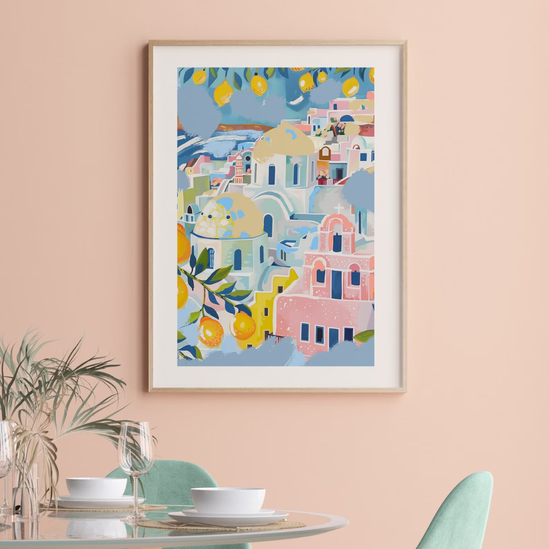 dining room with Amalfi Coast Italy poster hanging on pink wall