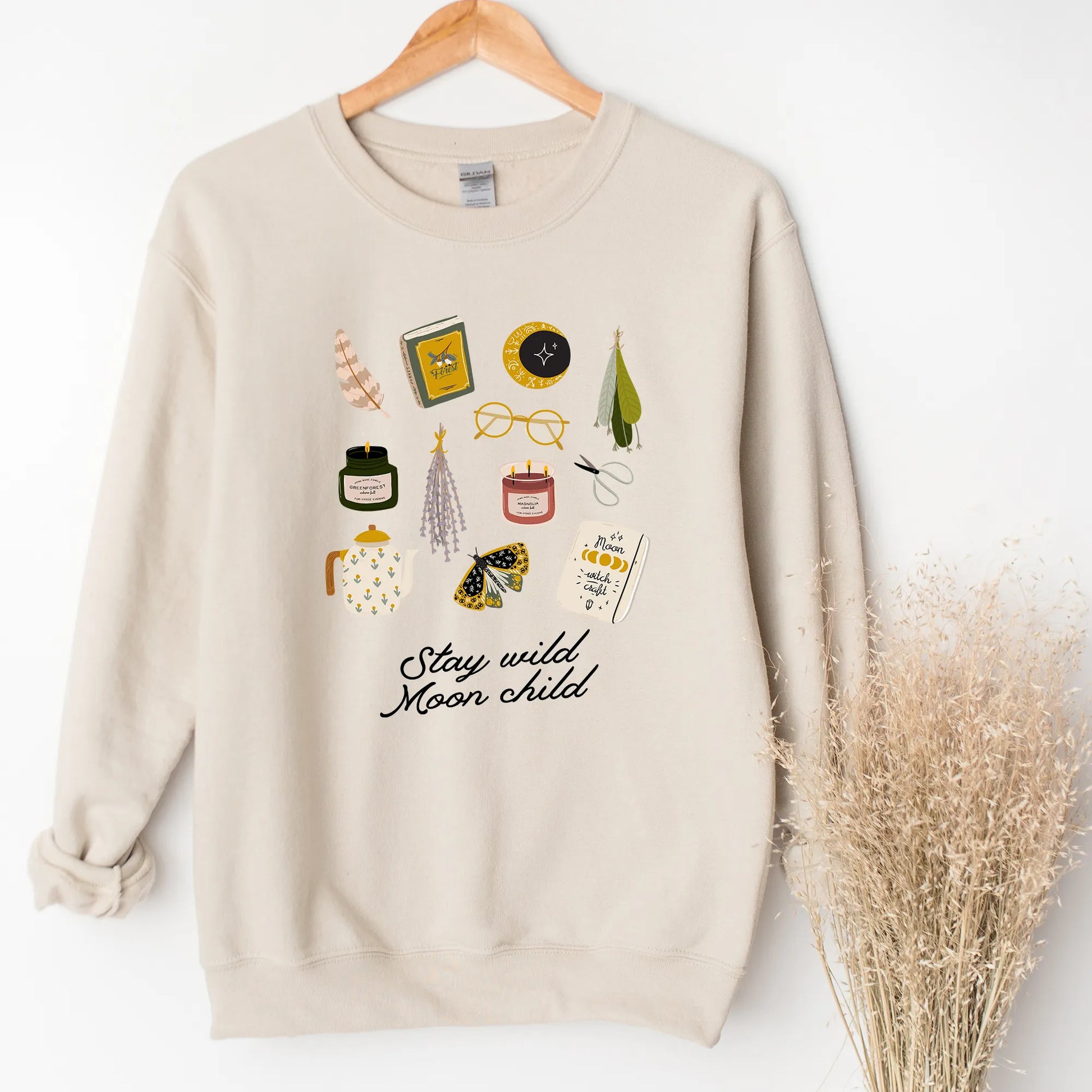 autumn sweatshirt from Blue Water Songs hanging on wall