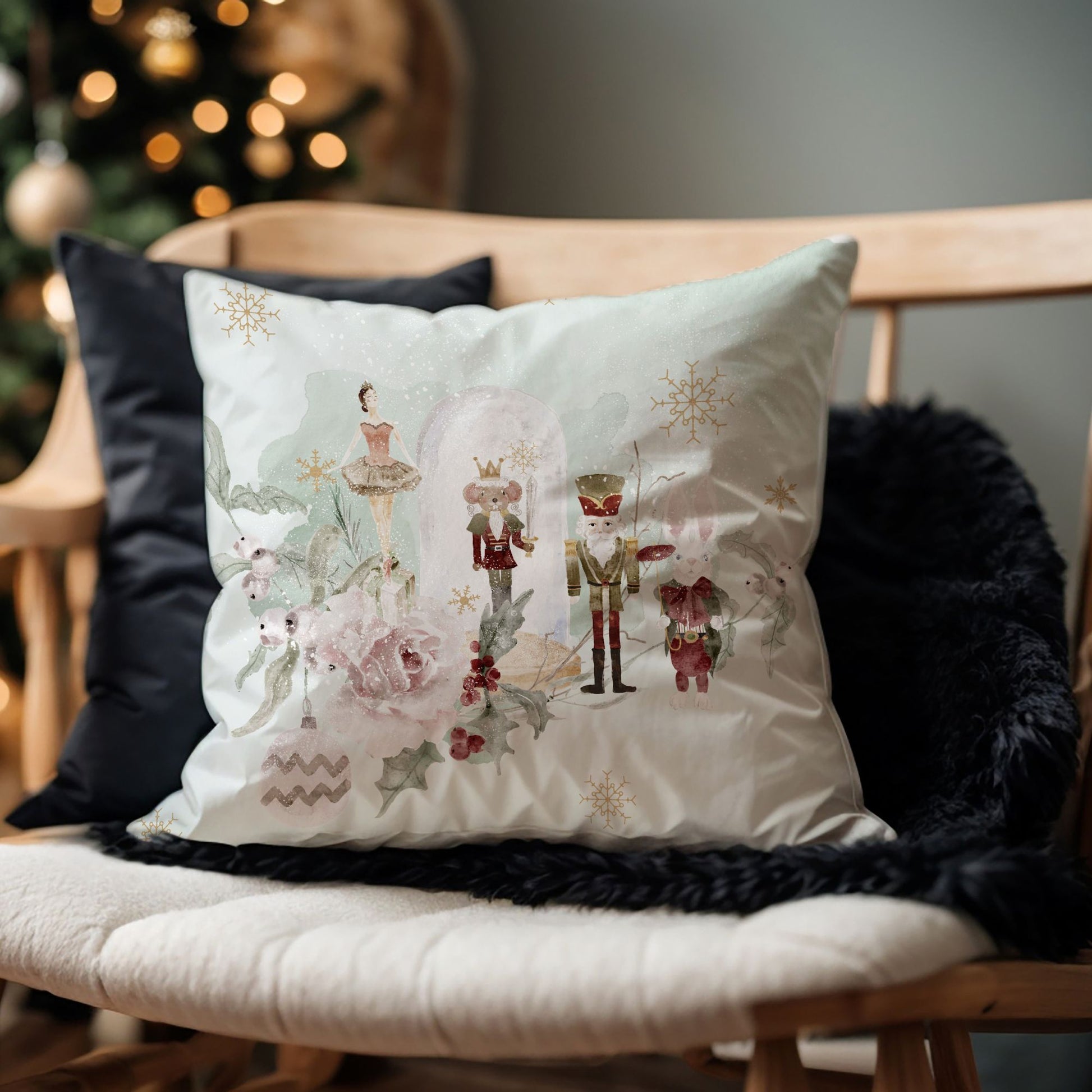 Pastel Nutcracker Christmas PILLOW featuring whimsical ballet characters and festive florals on a cozy chair.