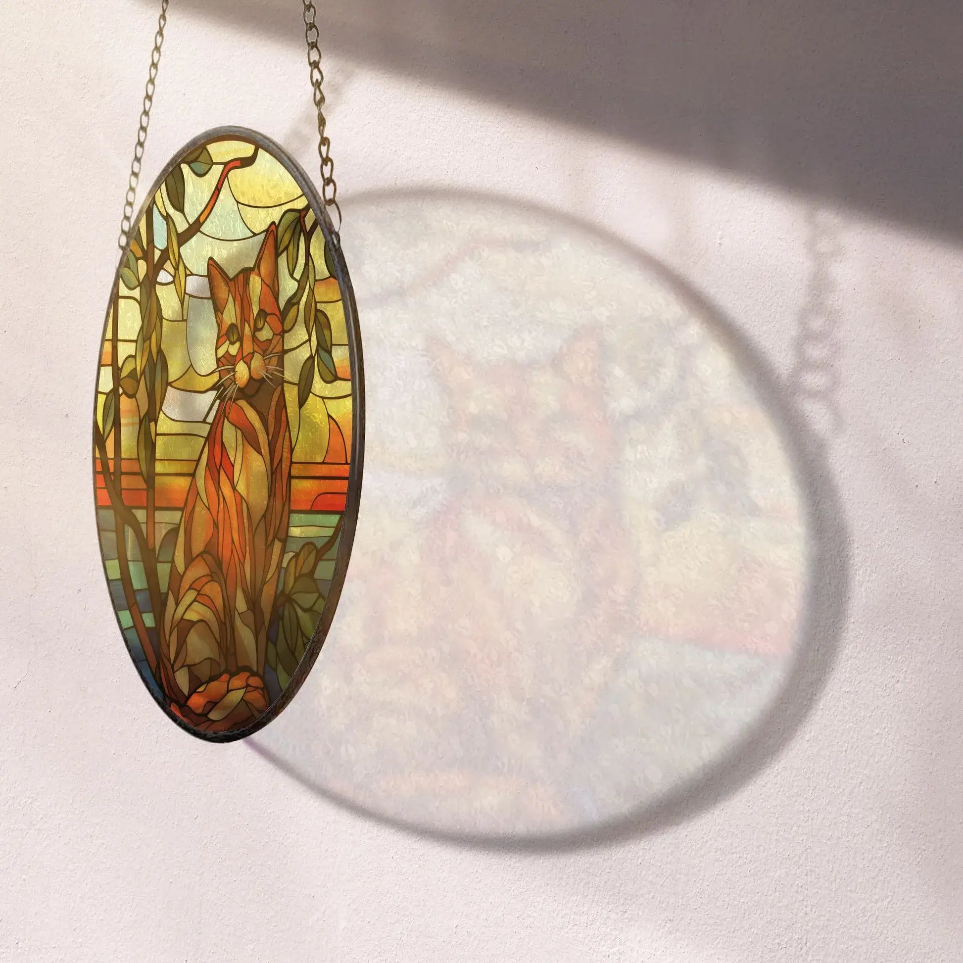 Orange Cat Ornament – Stained Glass Window Decoration casting shadows, adding warmth to your home decor.