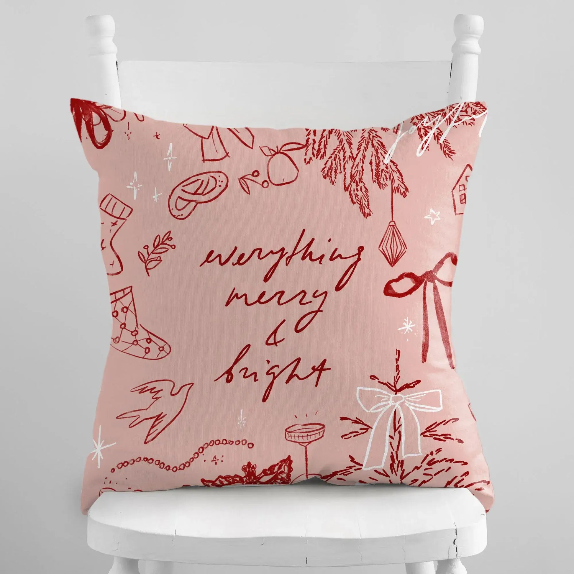 Merry and Bright Christmas Pillow Cover with hand-drawn holiday doodles on a pink background.