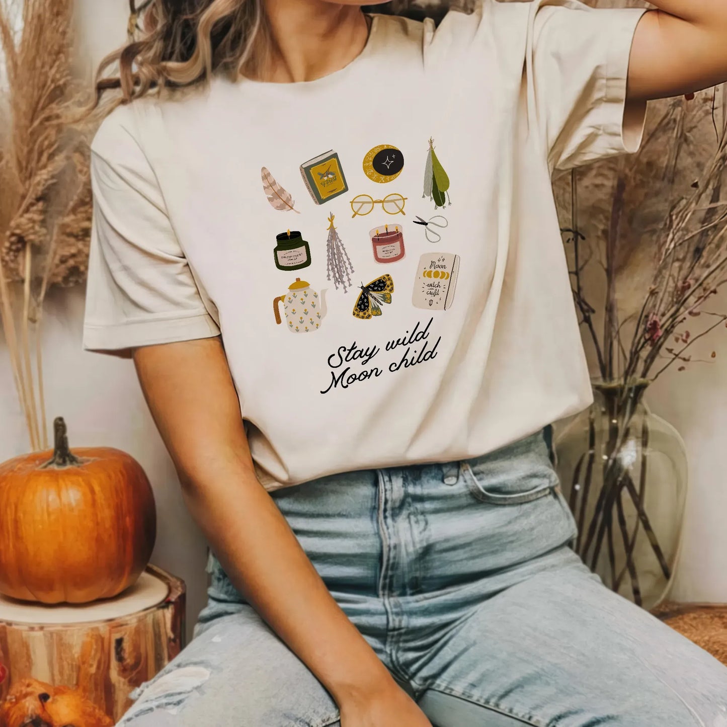 woman in 'Stay Wild Moon Child' Botanical T-SHIRT from Blue Water Songs