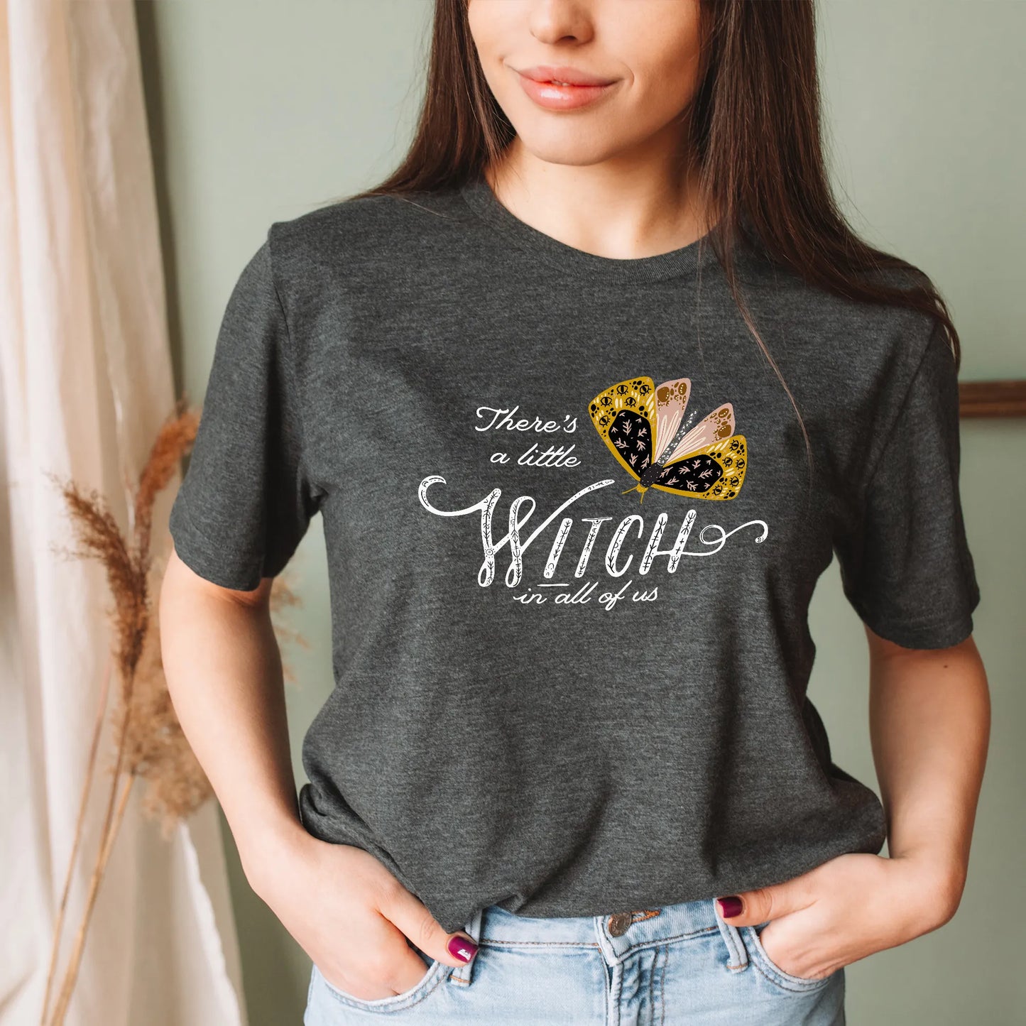 woman in 'There's a little witch in all of us' gray T-SHIRT from Blue Water Songs