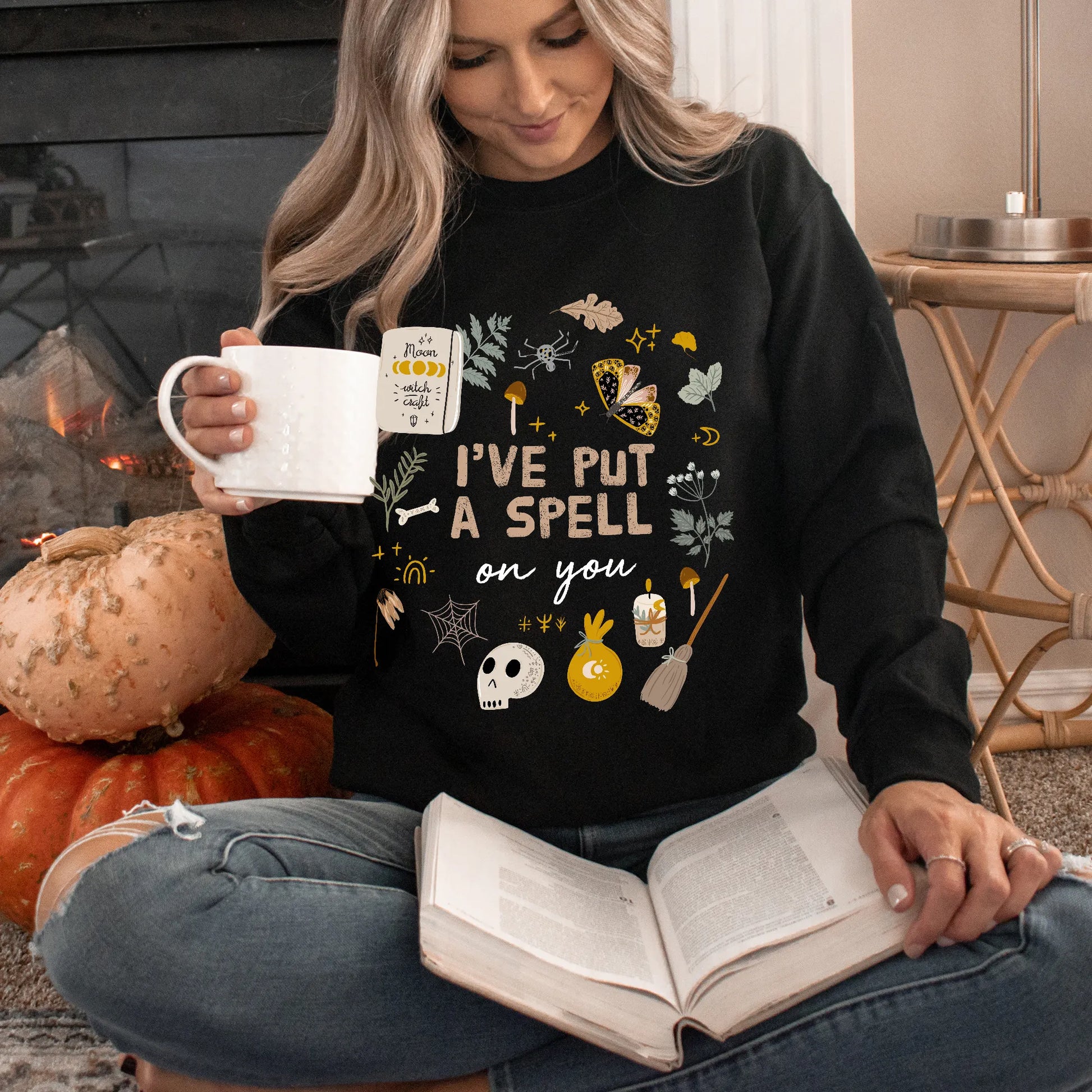 Cottage witch in 'I put a spell on you' SWEATSHIRT reading a book