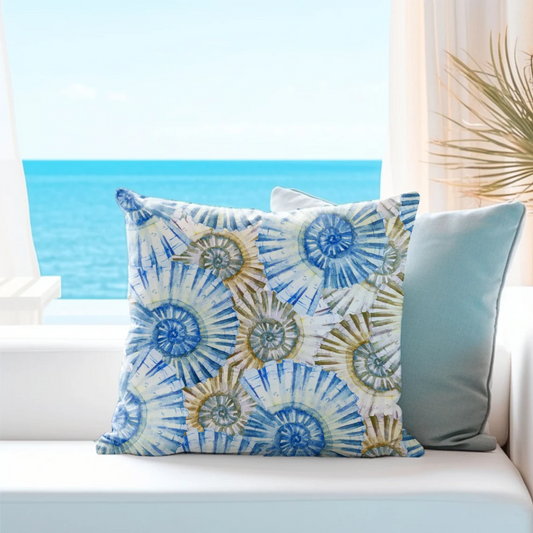 Watercolor Blue Seashells Nautica PILLOWs from Blue Water Songs in white bench next to window