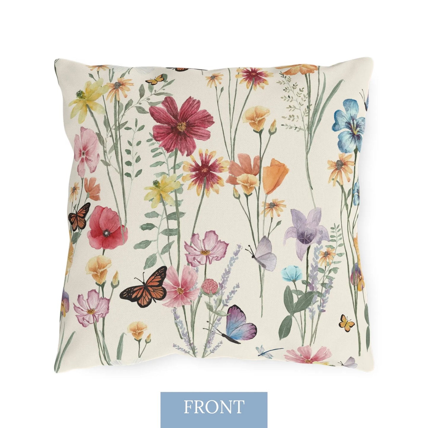 Front view of a square outdoor pillow featuring a watercolor-style wildflower and butterfly print in vibrant spring colors.