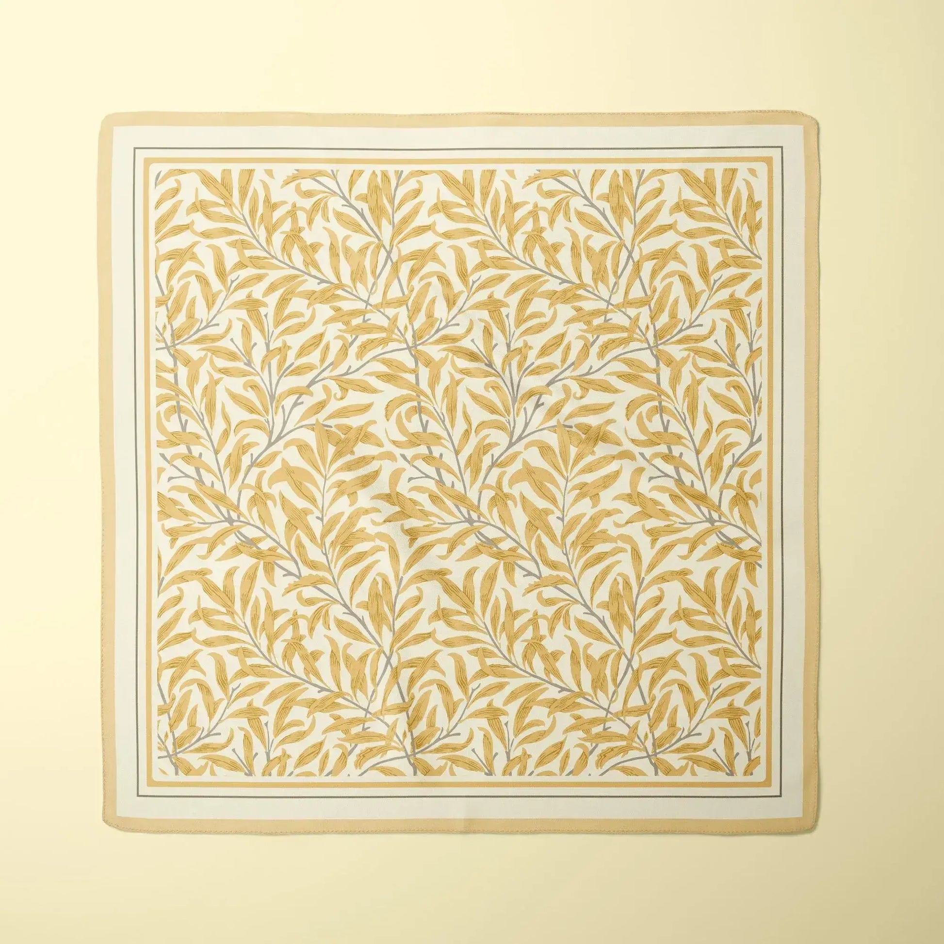 William Morris Silk Scarf Blue Willow Boughs featuring intricate botanical patterns in earthy tones on a soft background.