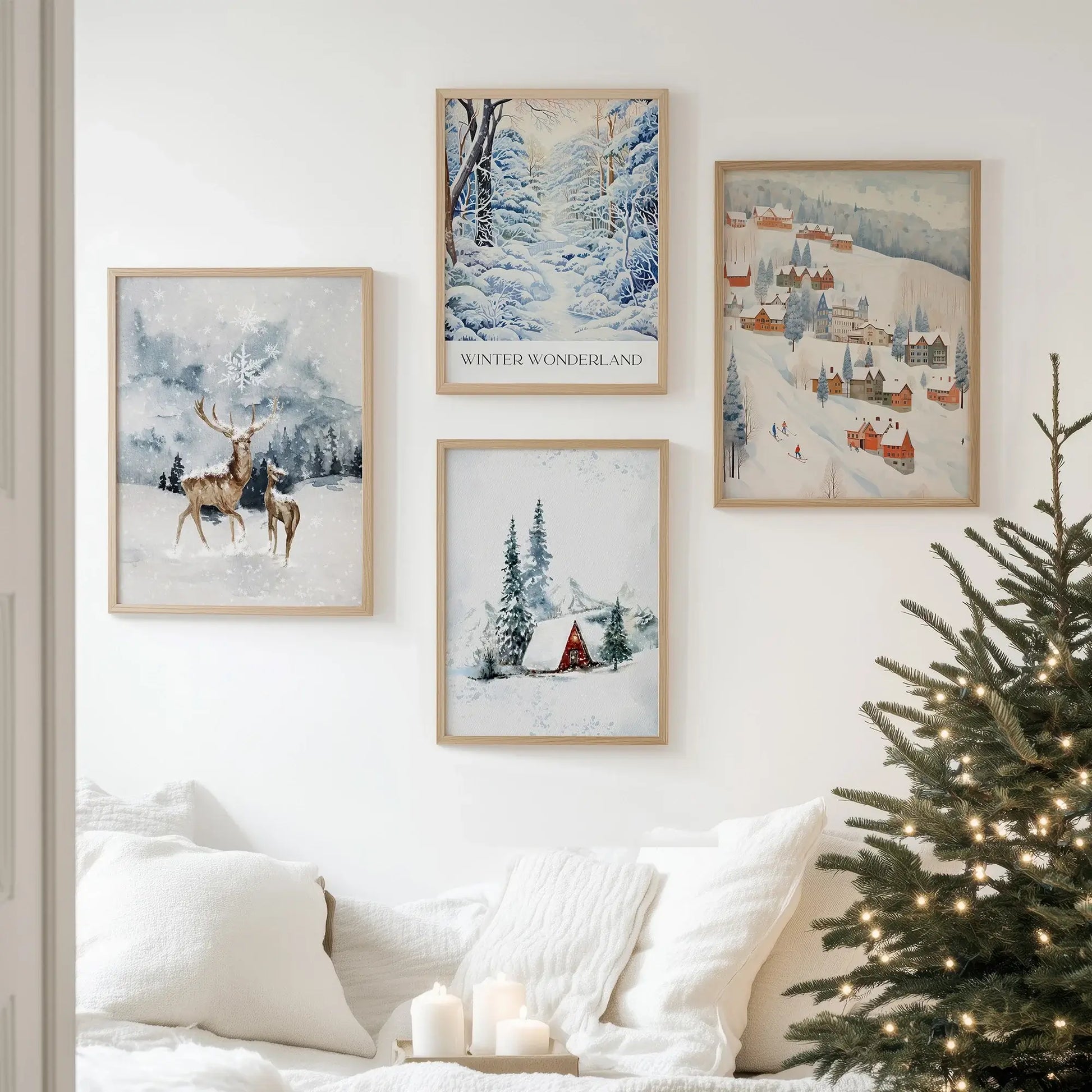 Beautiful display of Winter Wonderland Prints Set of 5 framed on a wall, showcasing serene winter scenes.