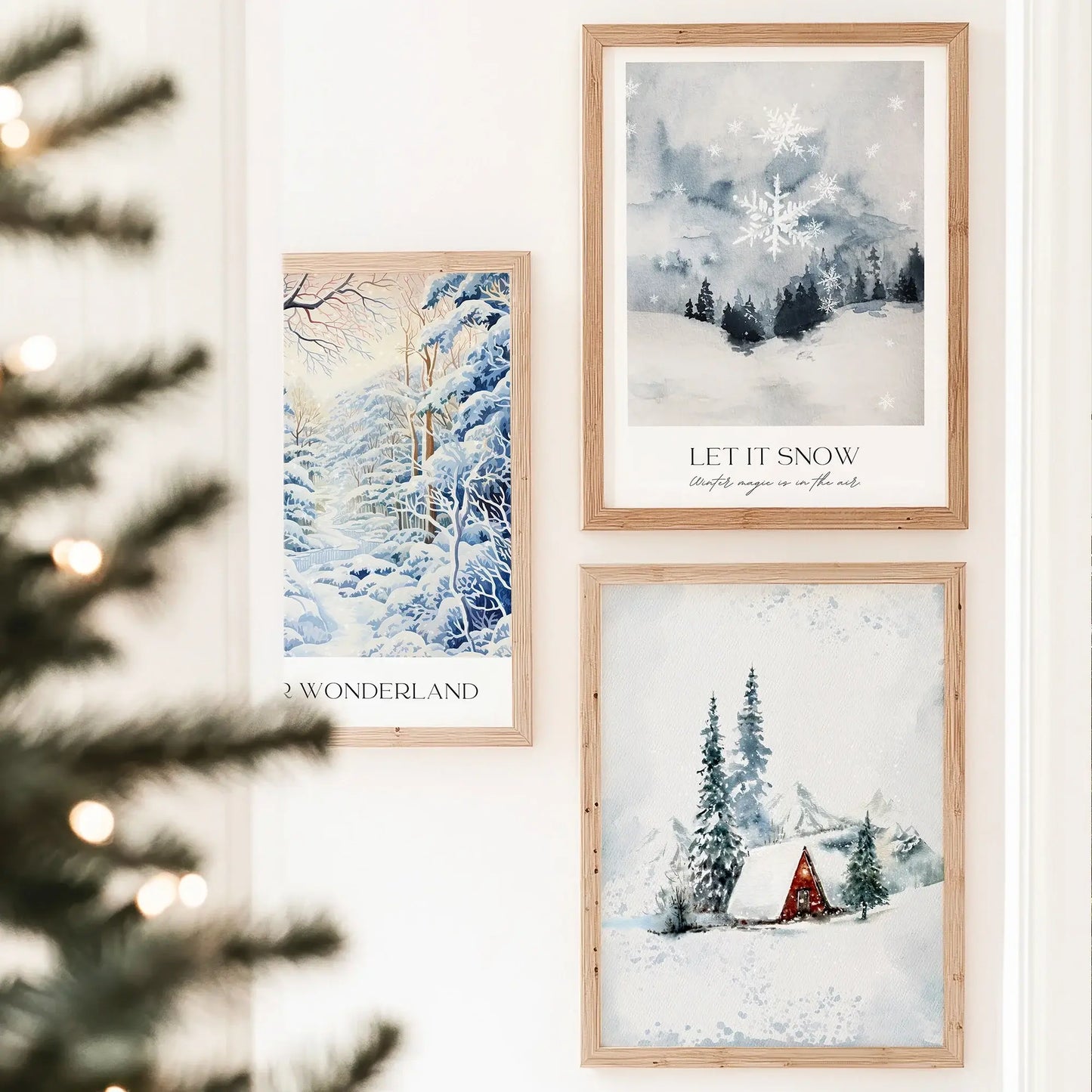 Winter Wonderland Prints Set of 5 displayed on a wall, featuring serene snowy landscapes and festive winter themes.