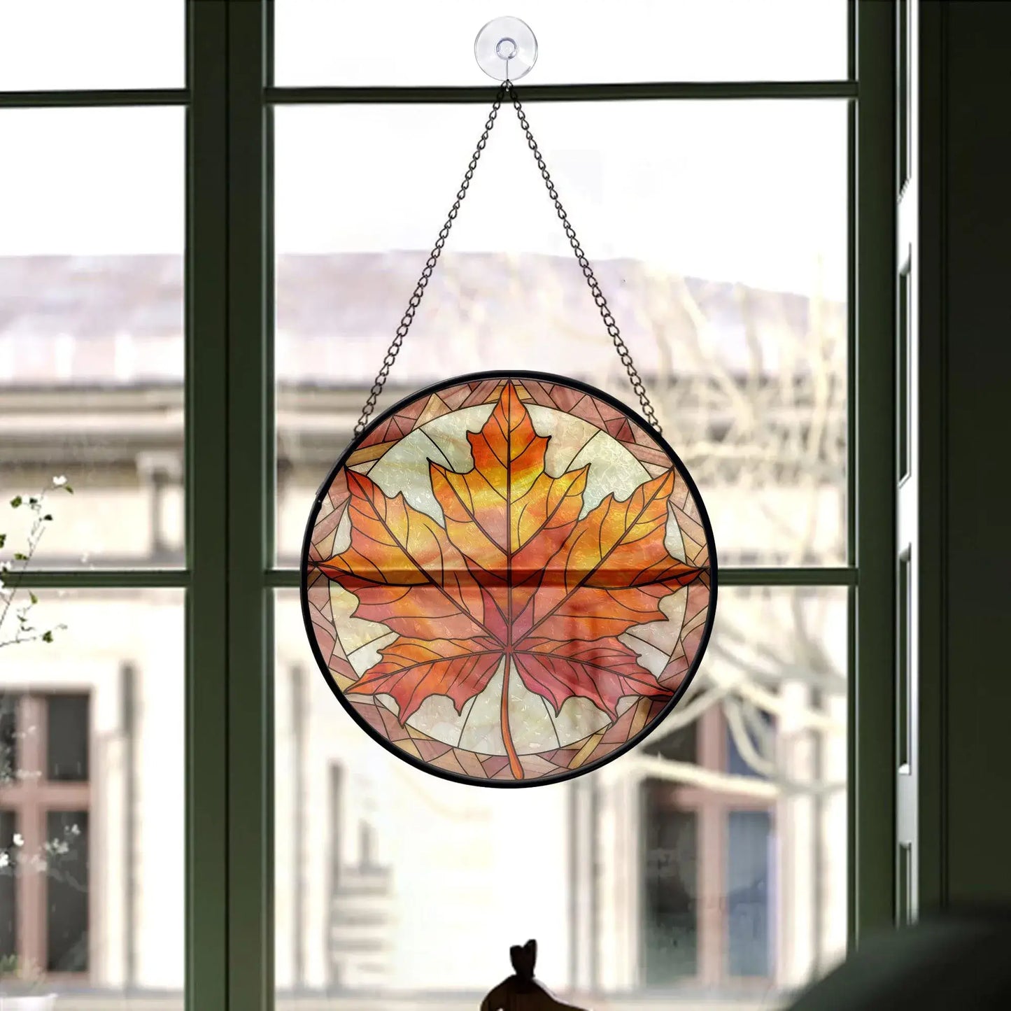 Fall Leaves Round Stained Glass Ornament hanging on window