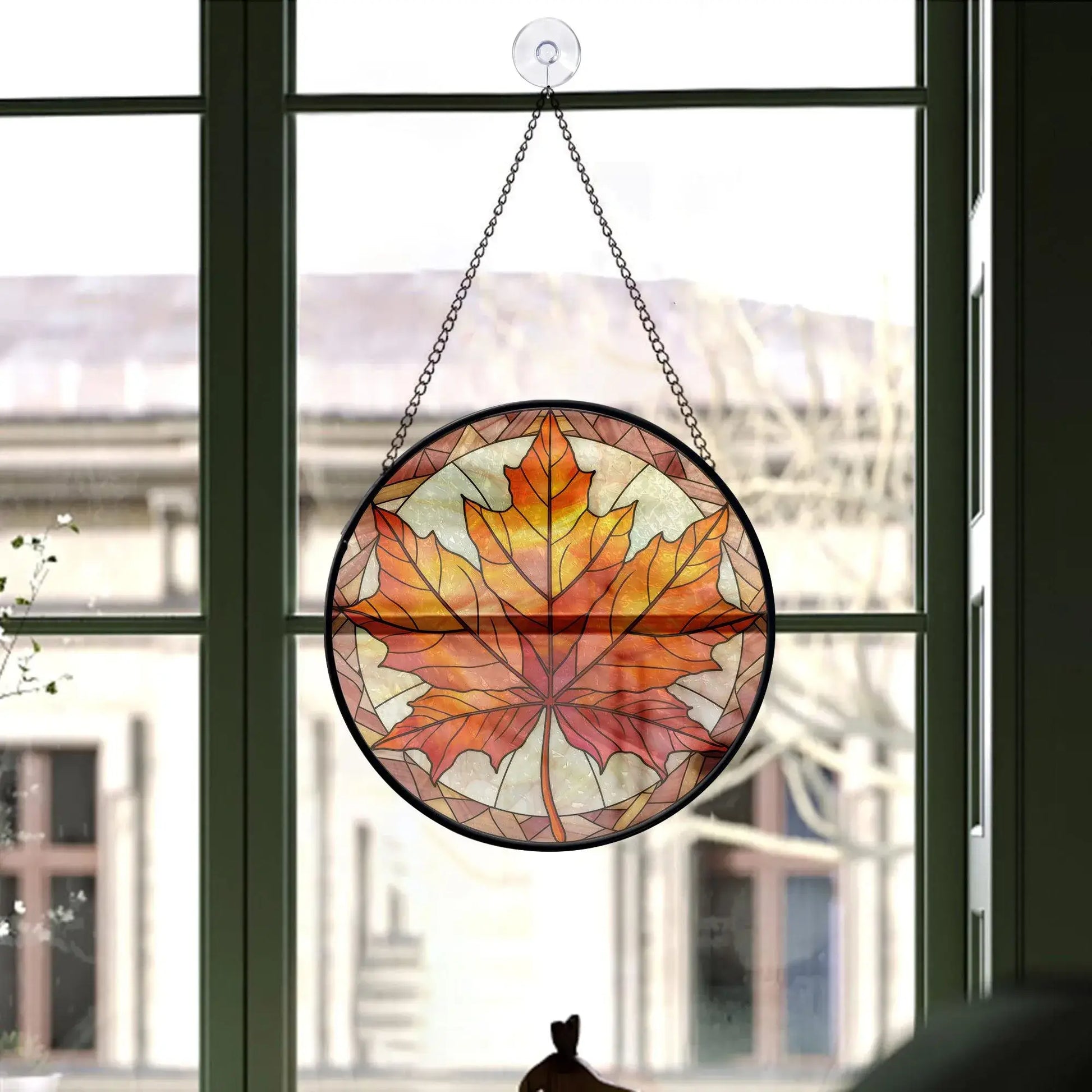 Fall Leaves Round Stained Glass Ornament hanging on window