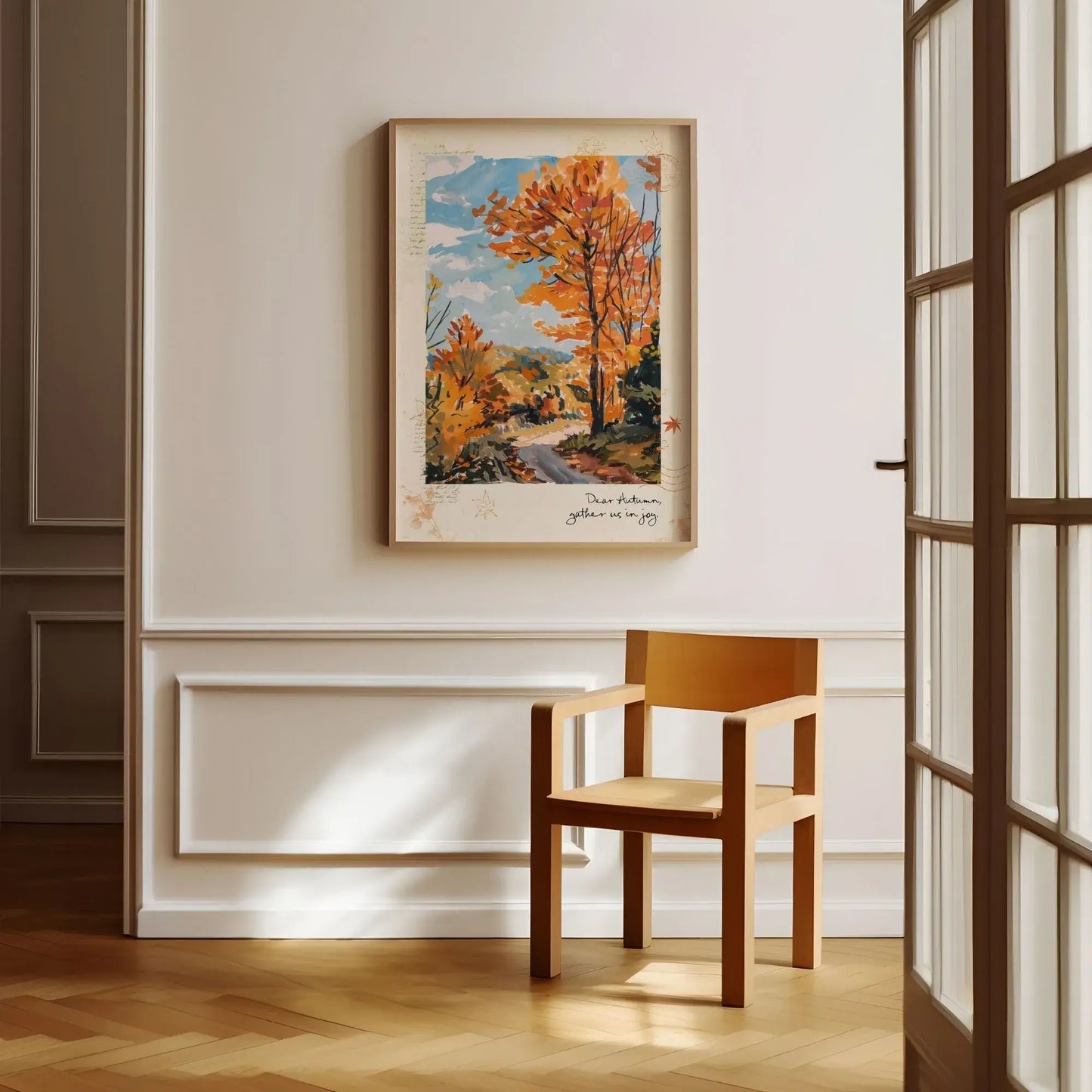 Framed autumnal wall art “Autumn Road” with golden trees and path, styled in classic interior with wood chair and wall paneling