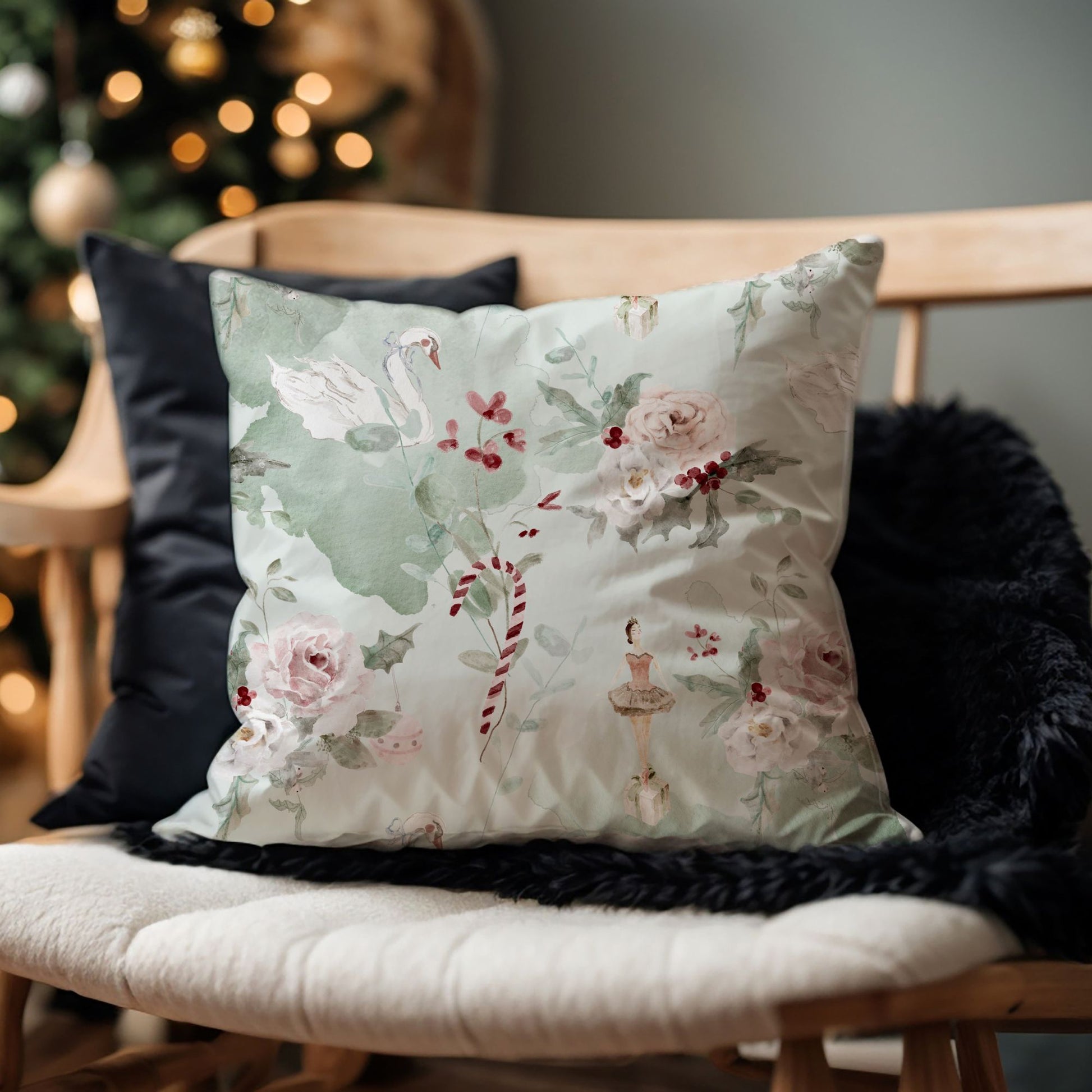 Ballerina Christmas Pillow Cover featuring floral designs and winter details on a cozy chair.