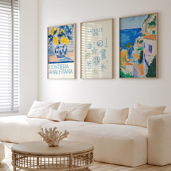 cream minimal living room with 3 summer Italy posters on the wall