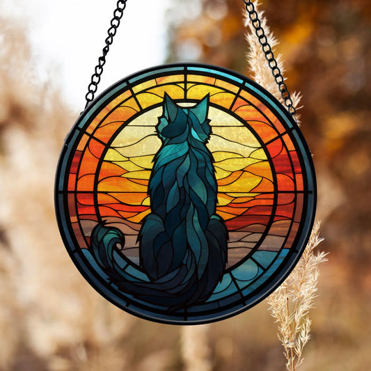 black cat glass ornament hanging on window 
