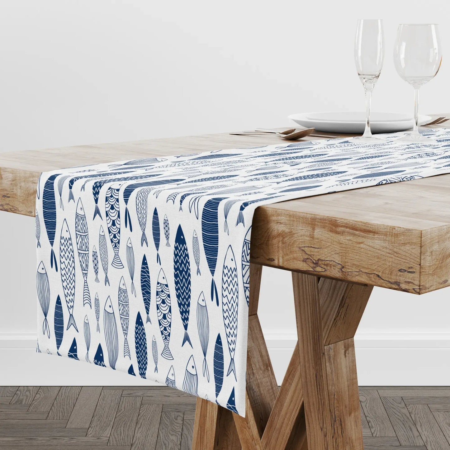 Blue Fish Coastal Table Runner – Nautical Dining Decor on a wooden table, featuring hand-illustrated fish patterns.