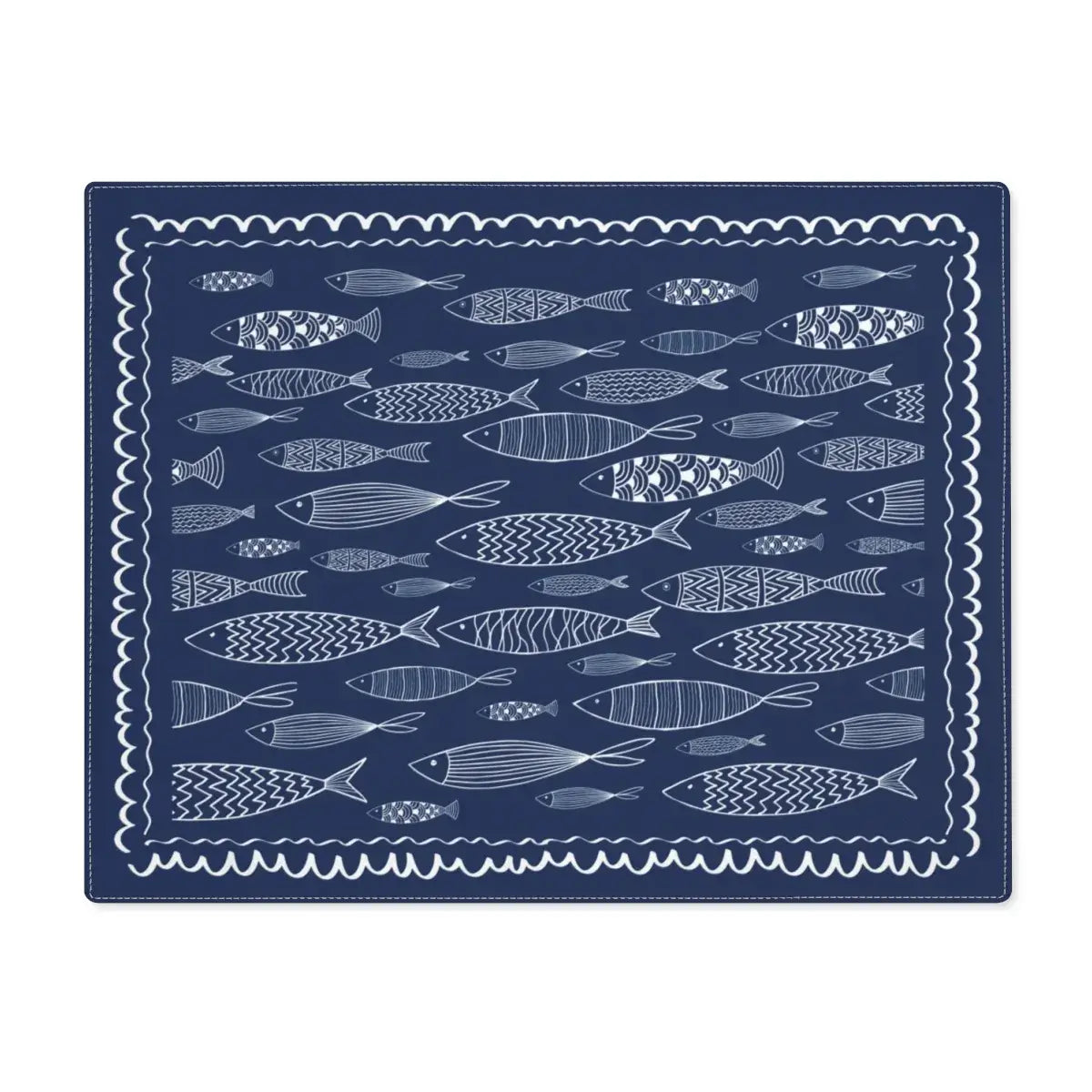 Blue Fish Cotton Placemats featuring hand-drawn fish illustrations in navy blue on coastal-themed table linen.